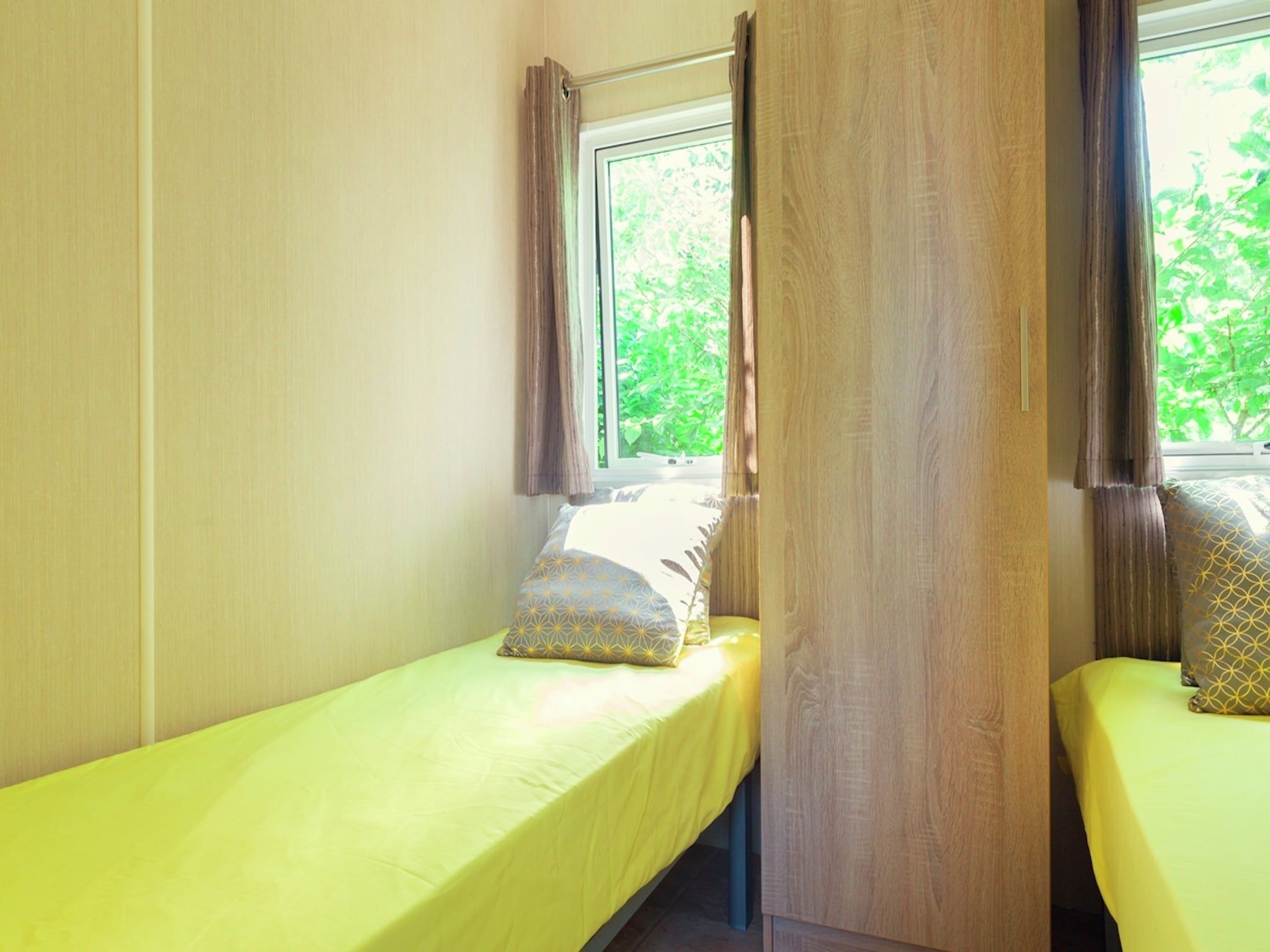 Een slaapkamer van Vakantiepark Mölke 3 in Zuna