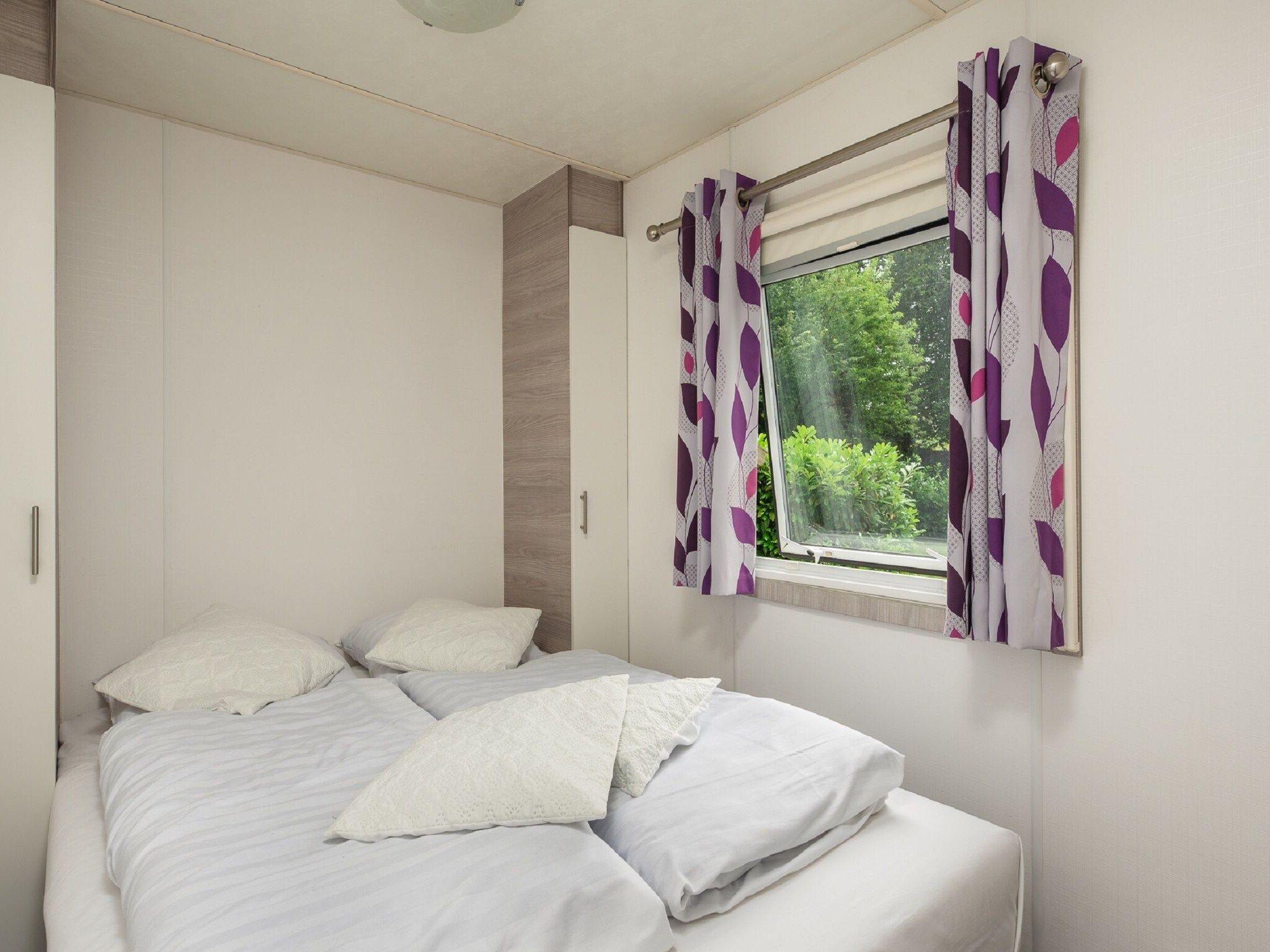 Een slaapkamer van Vakantiepark Mölke 5 in Zuna