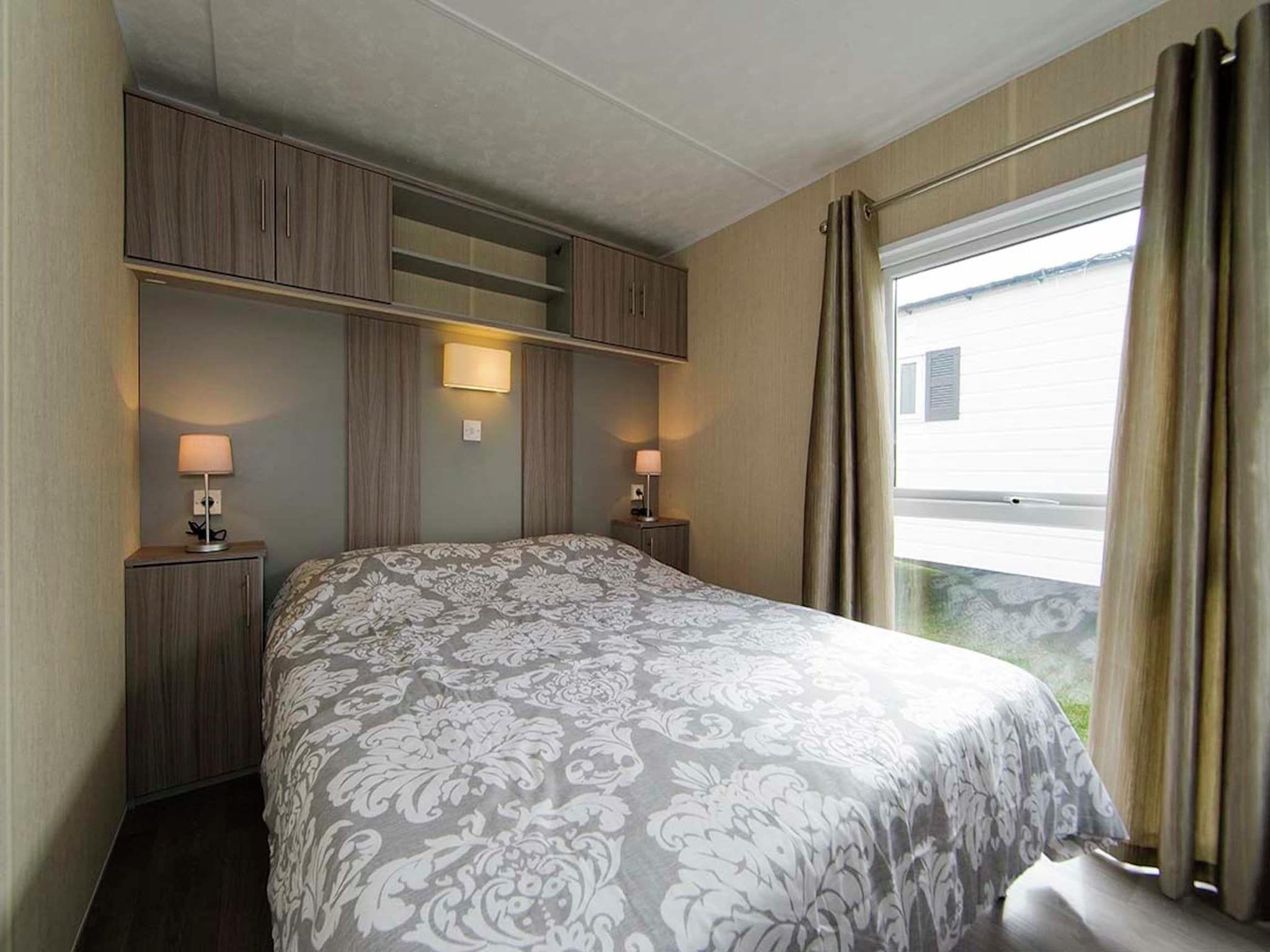 Een slaapkamer van Vakantiepark Mölke 10 in Zuna