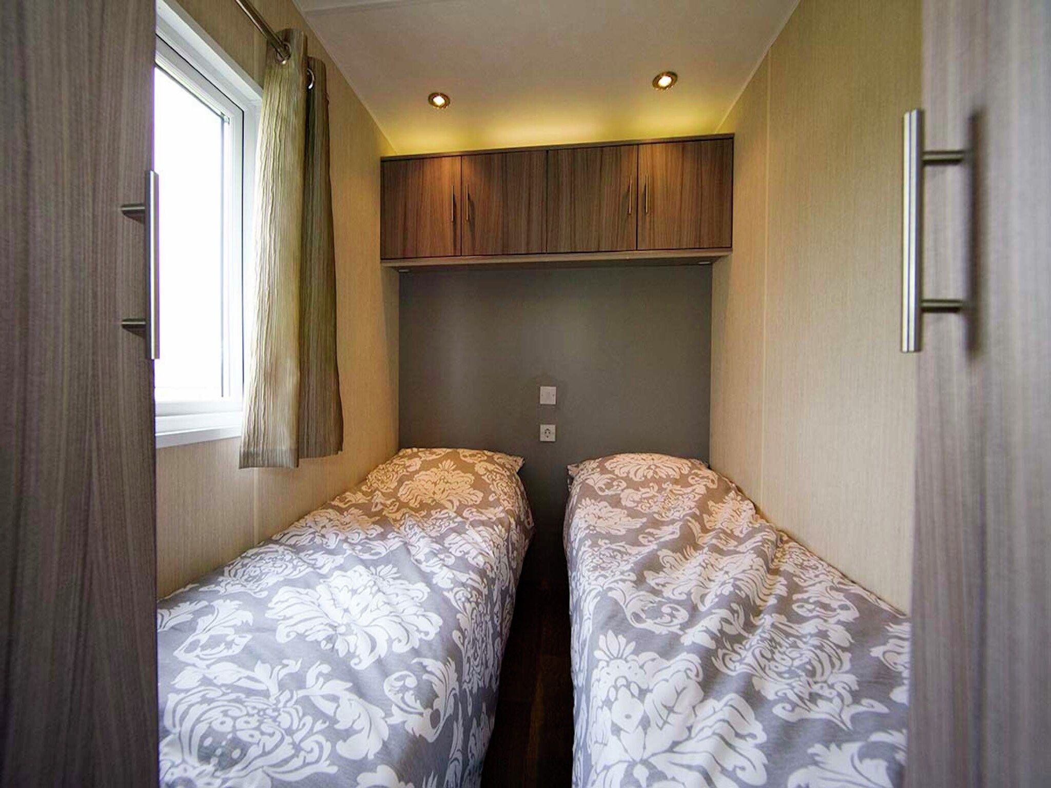 Een slaapkamer van Vakantiepark Mölke 10 in Zuna
