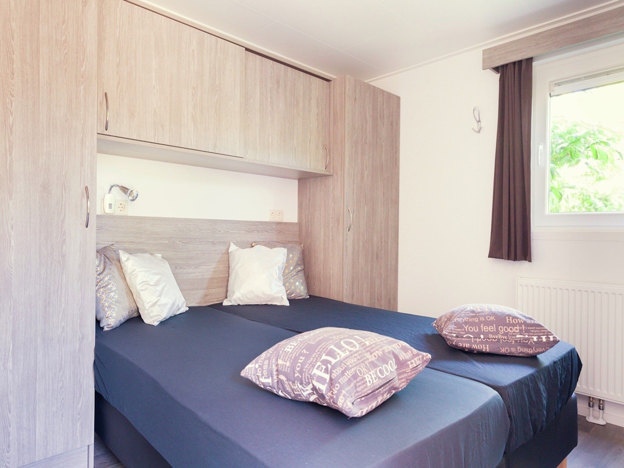 Een slaapkamer van Vakantiepark Mölke 11 in Zuna