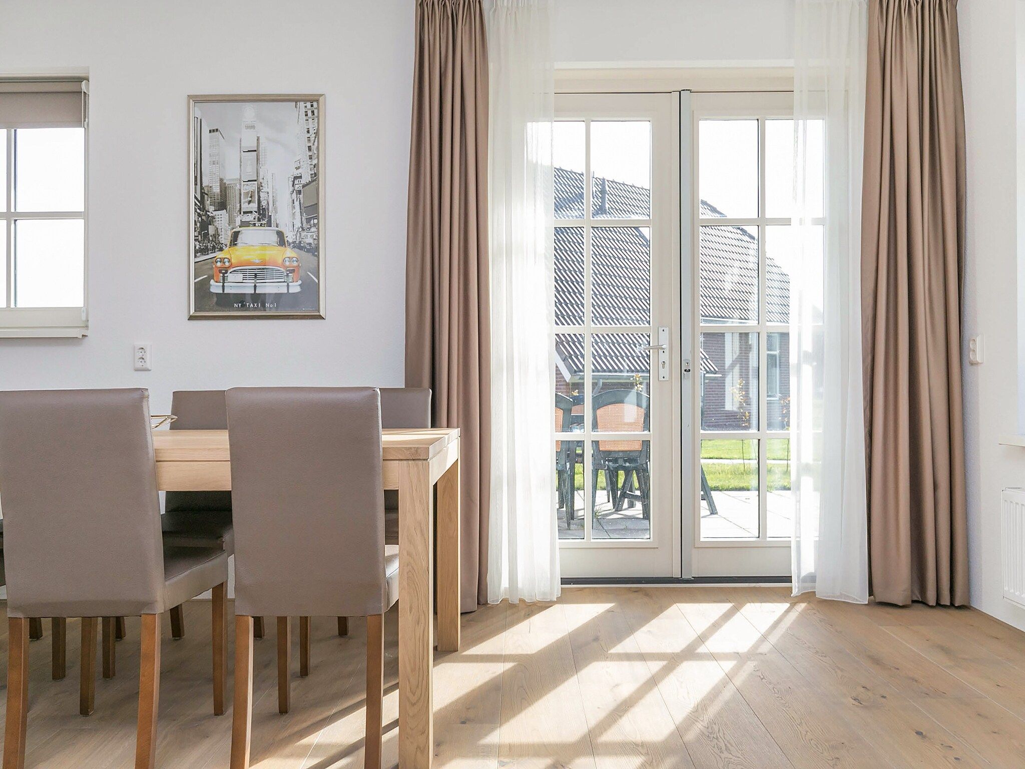 De woonkamer van Villaparc Schoonhovenseland in Hollandscheveld
