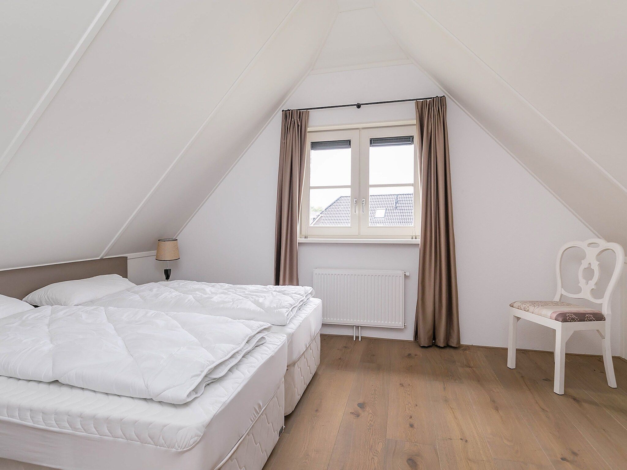 Een slaapkamer van Villaparc Schoonhovenseland in Hollandscheveld