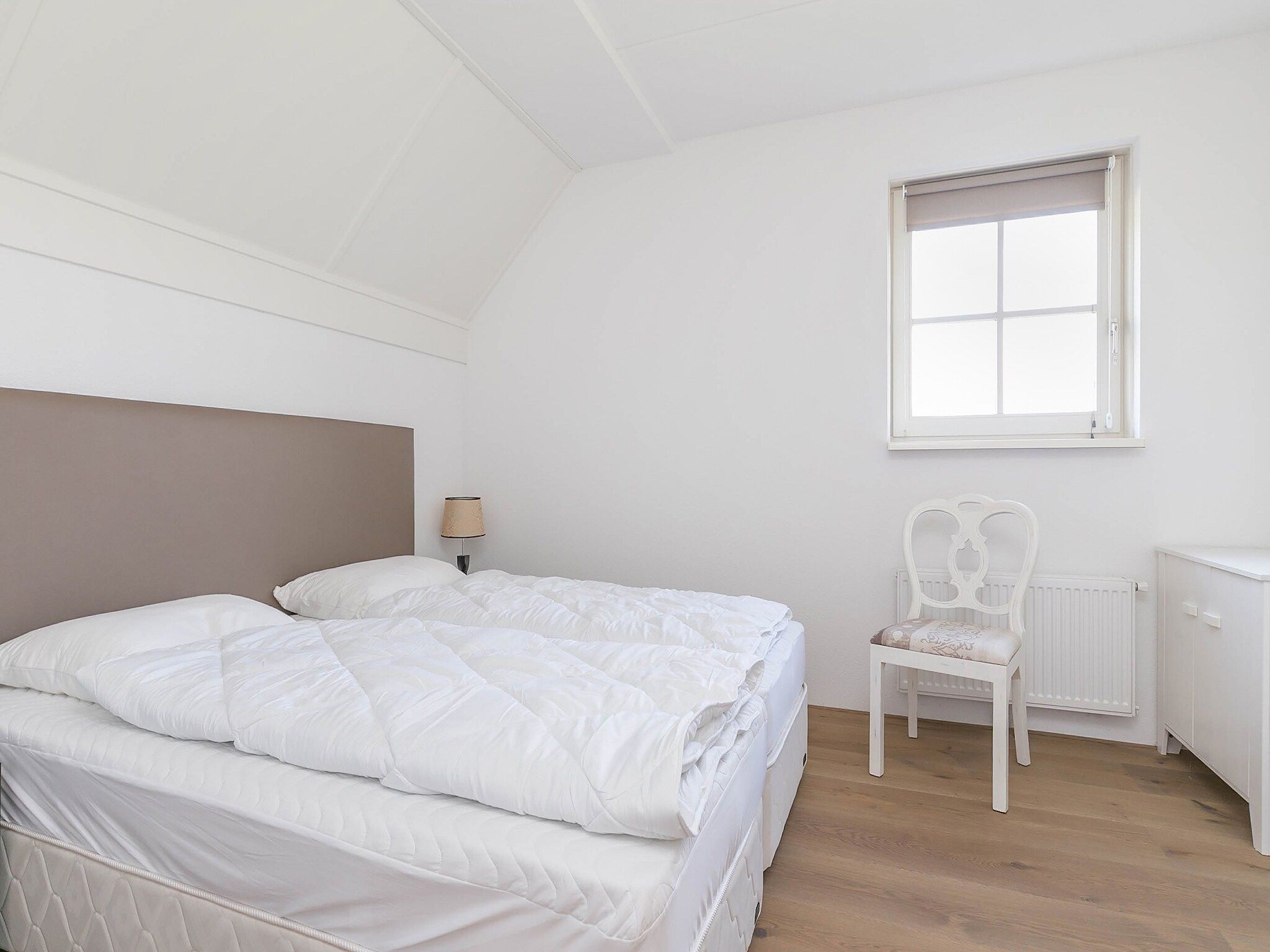 Een slaapkamer van Villaparc Schoonhovenseland in Hollandscheveld