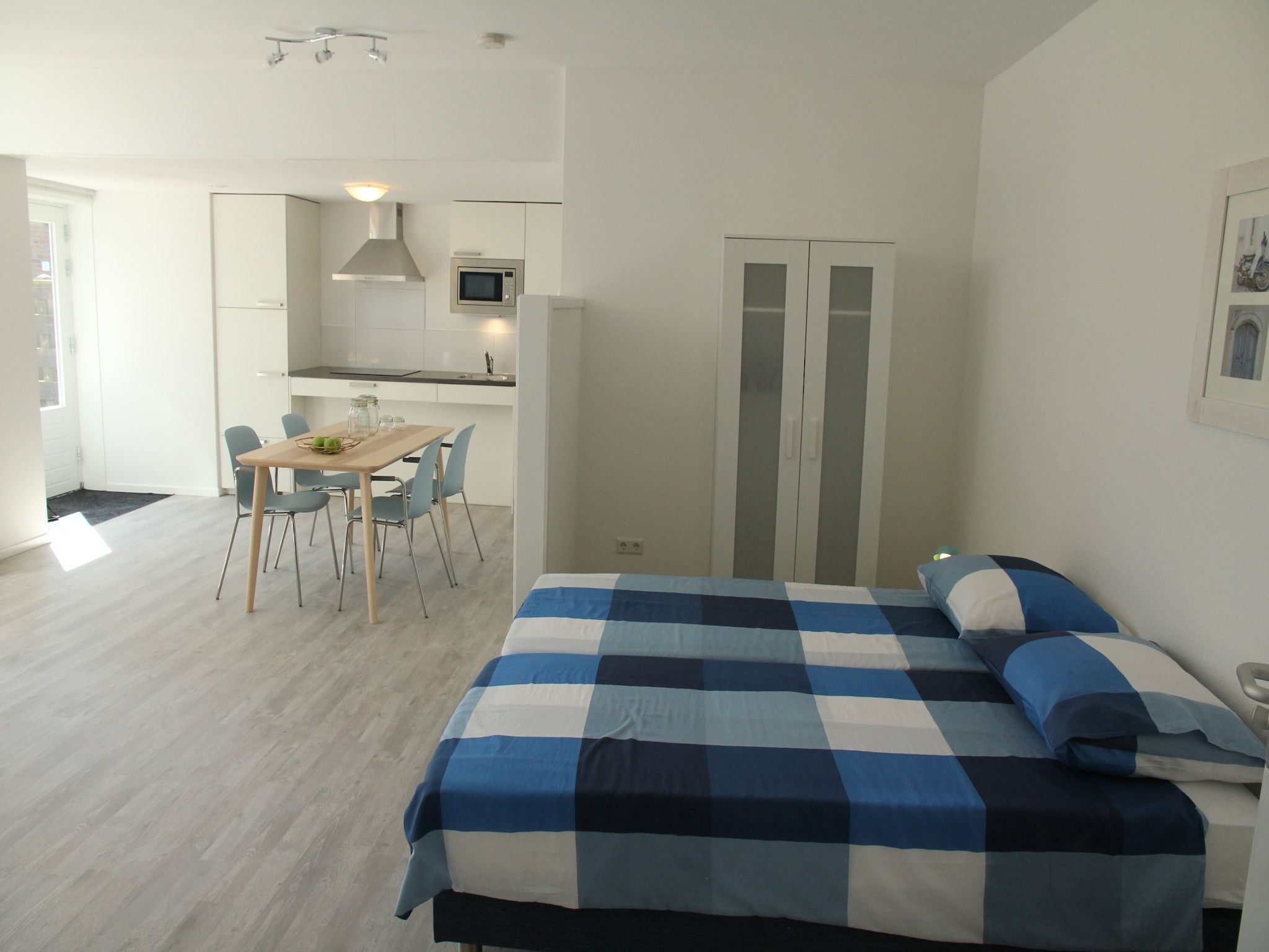 Een slaapkamer van De Beukelaar 2pers in Schoorl