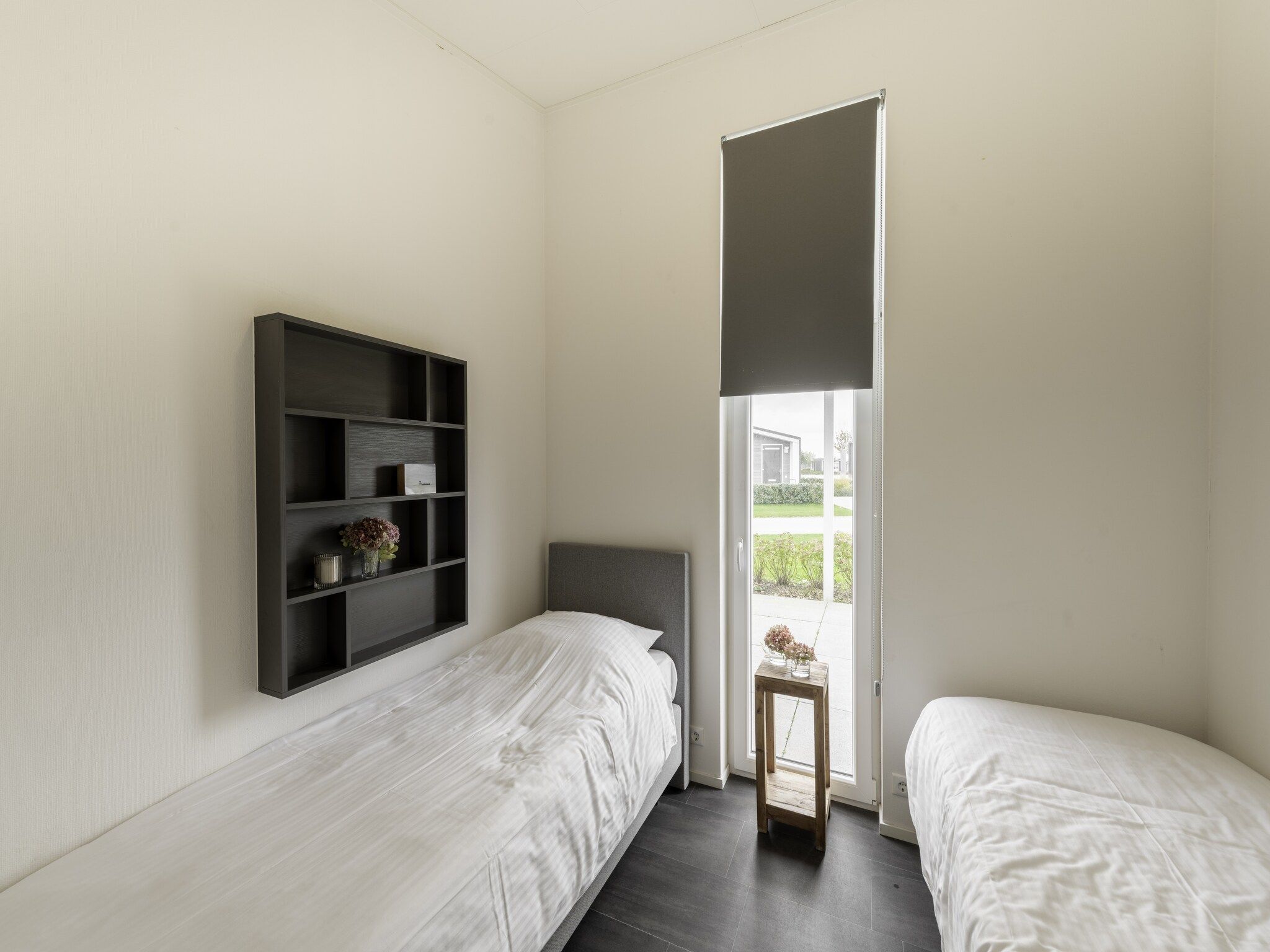 Een slaapkamer van Water Resort Oosterschelde 91 in Wemeldinge