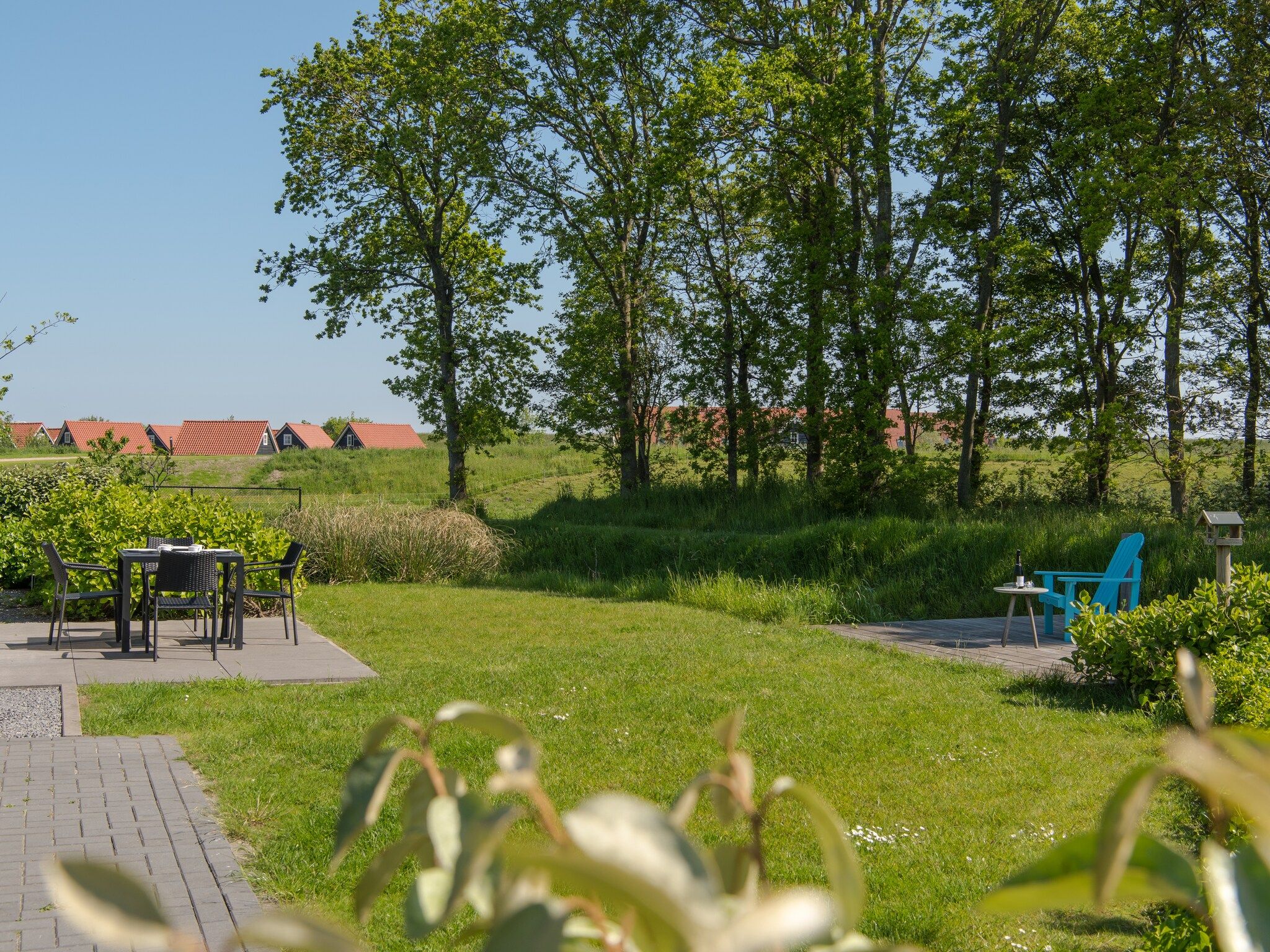 De tuin van Water Resort Oosterschelde 91 in Wemeldinge