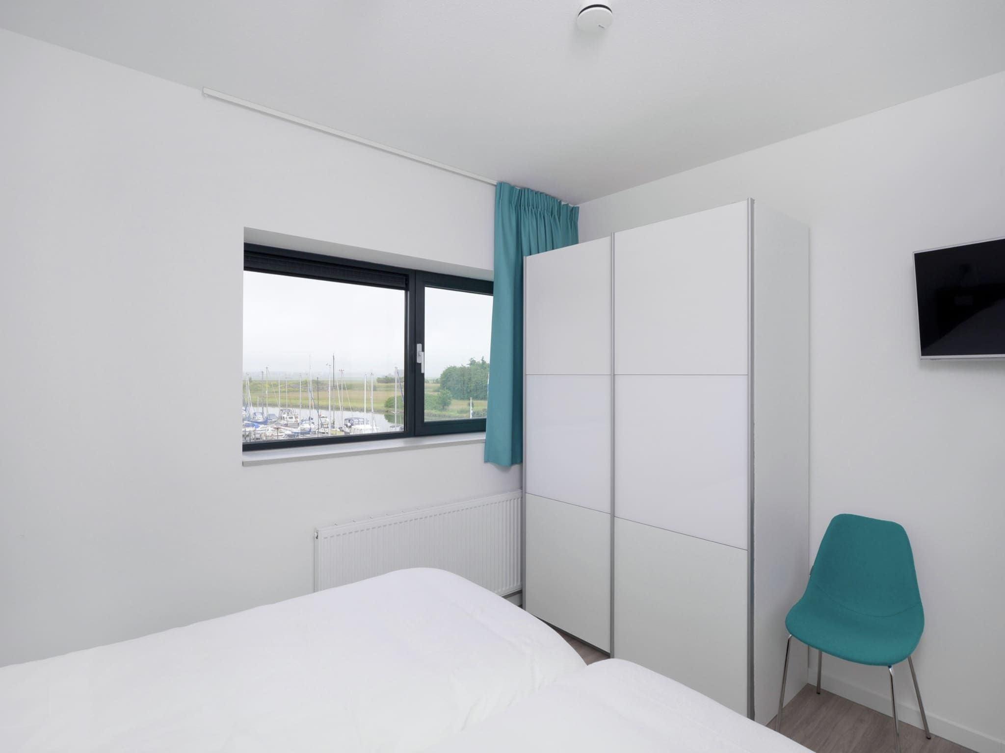 Een slaapkamer van Veerse Muze 7f in Kamperland