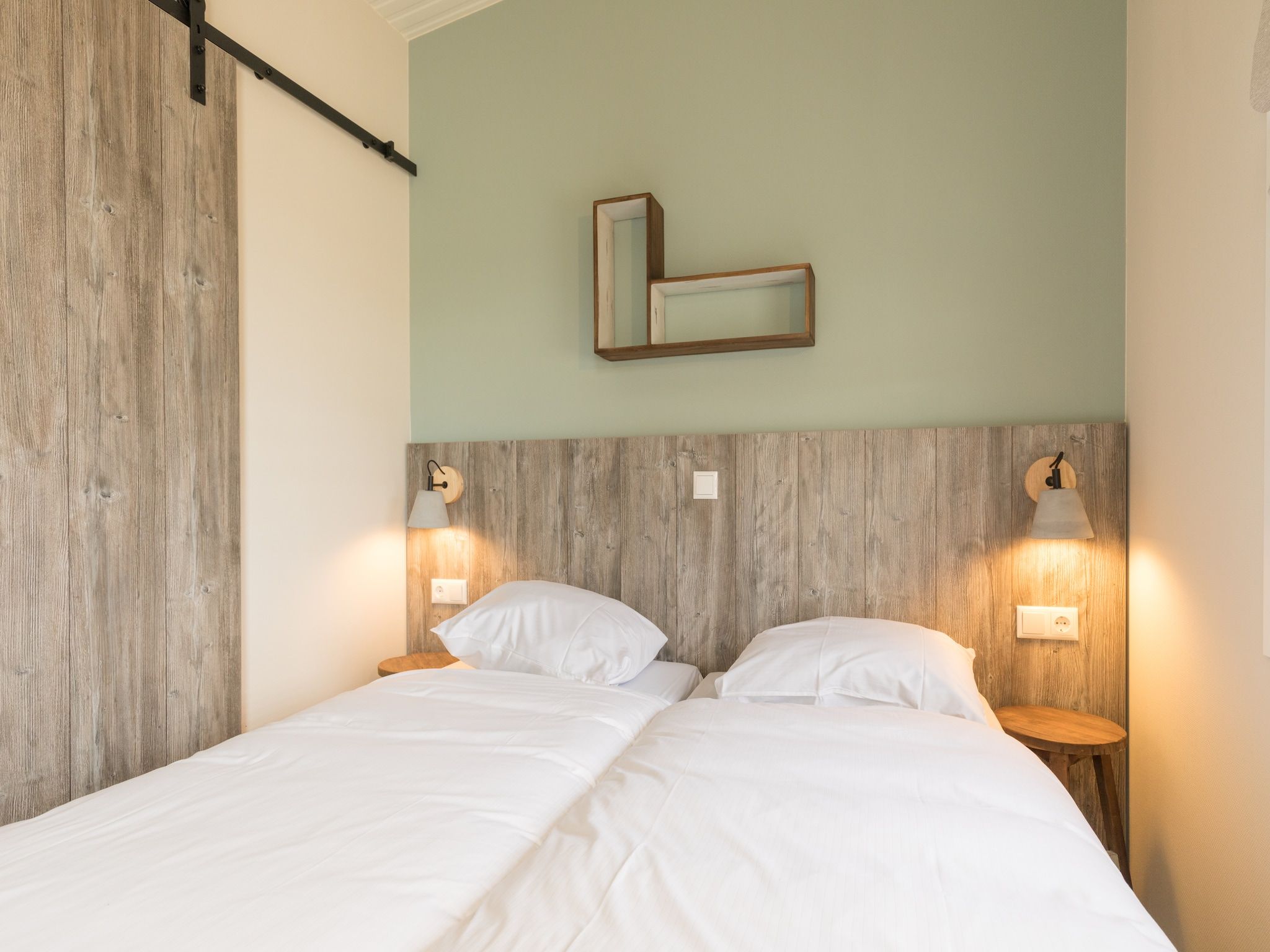 Een slaapkamer van Sea Lodges Ameland 3 in Hollum