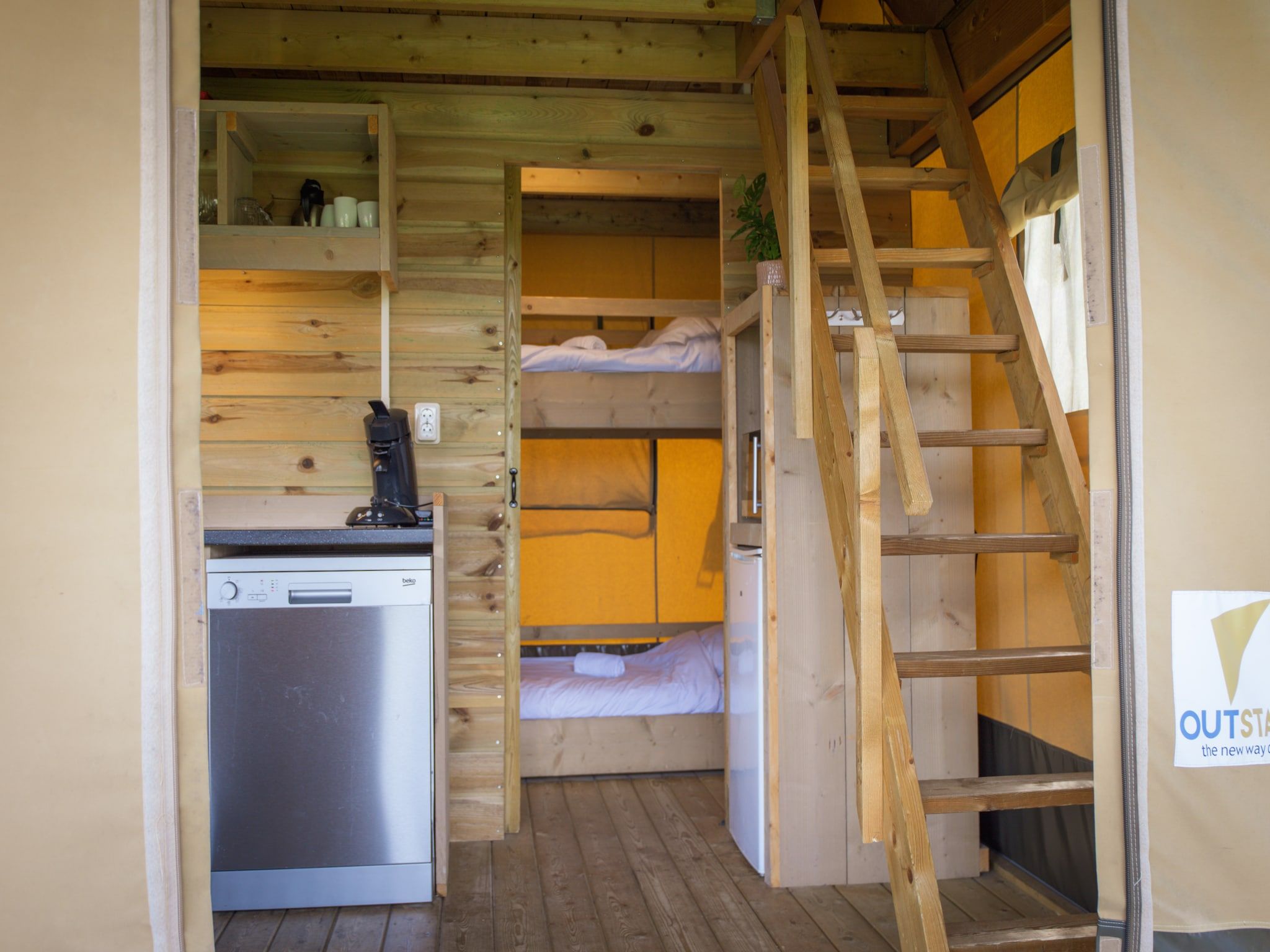 Een slaapkamer van Recreatiepark de Boshoek 1 in Voorthuizen