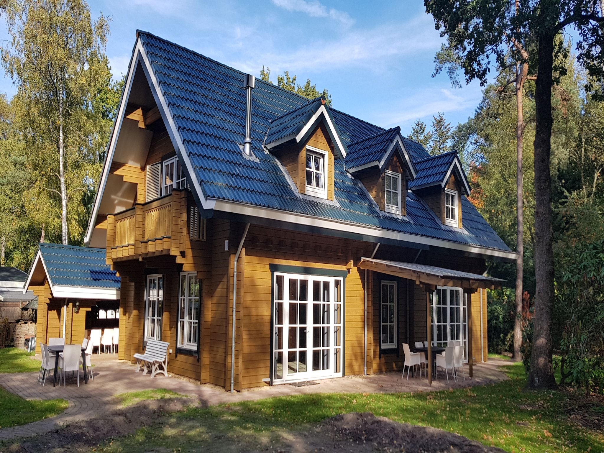 De buitenkant van Vakantiepark De Rimboe & De Woeste Hoogte 1 in Hoenderloo