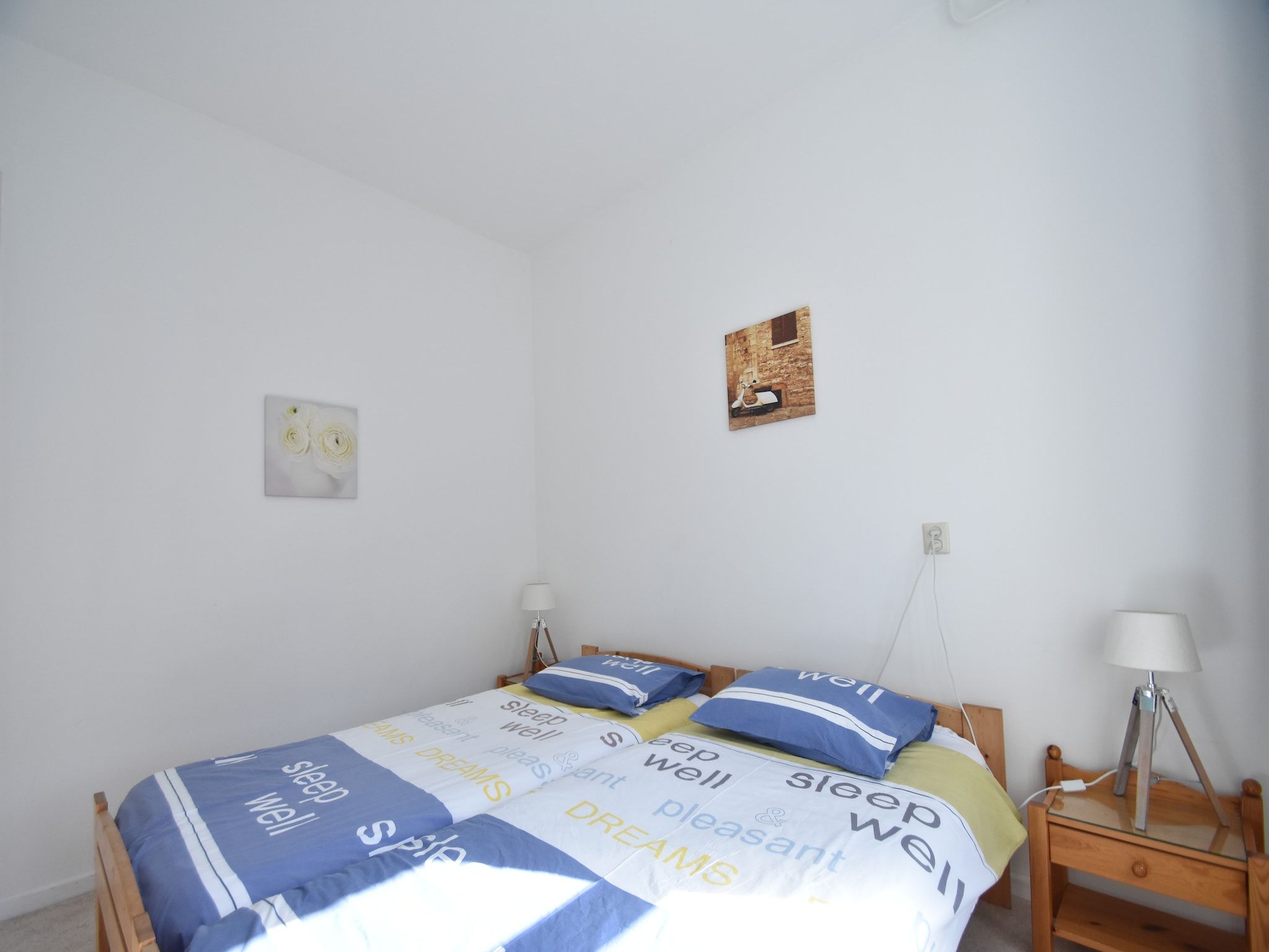 Een slaapkamer van Huize Glory Turkoois in Bergen aan Zee