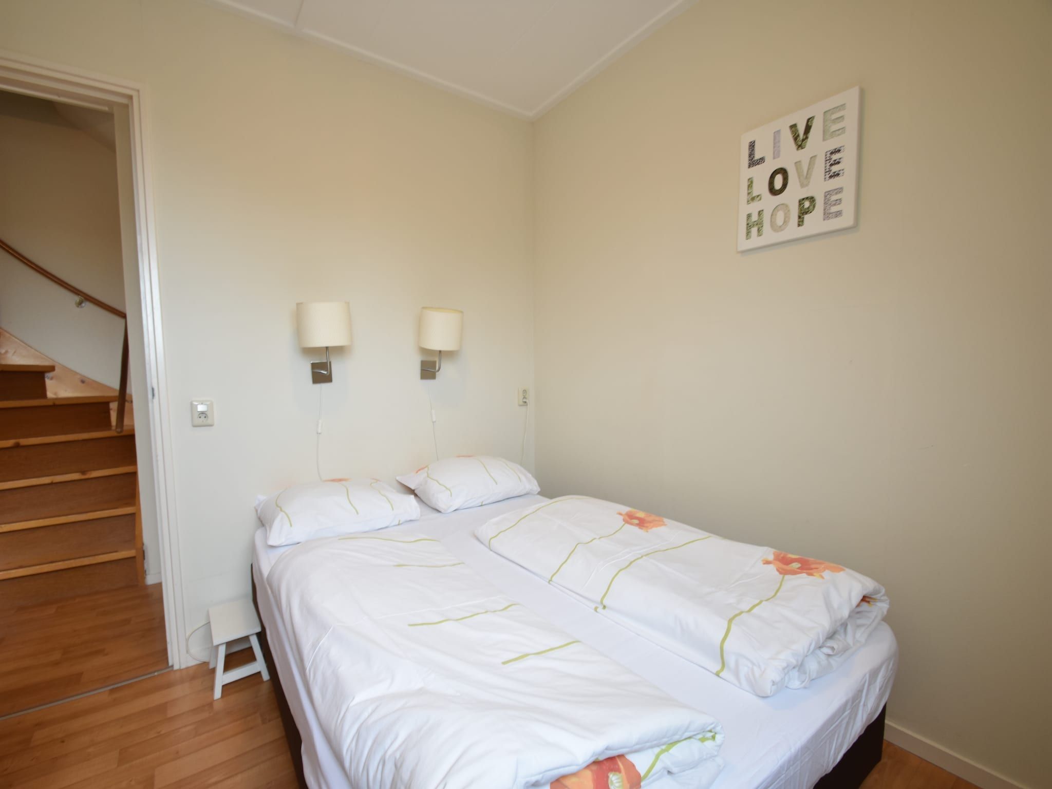 Een slaapkamer van Huize Glory Tijgeroog in Bergen aan Zee