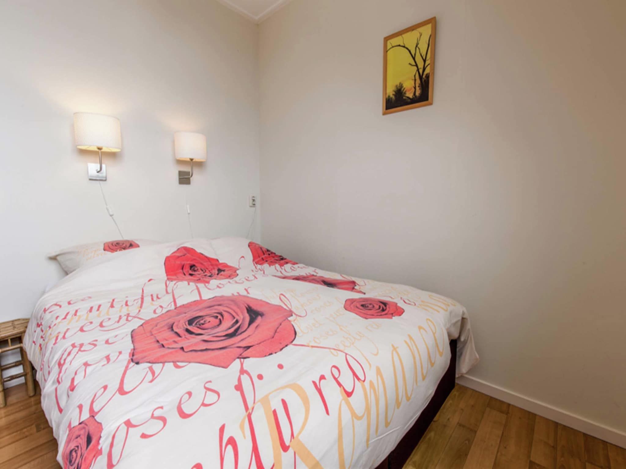 Een slaapkamer van Huize Glory Tijgeroog in Bergen aan Zee
