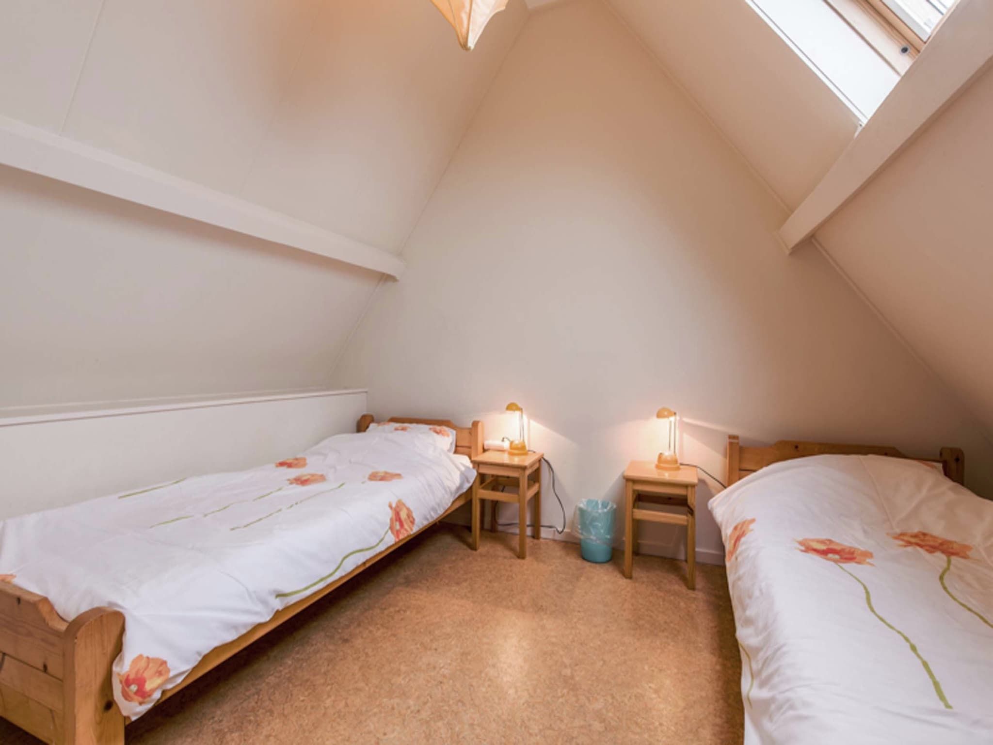 Een slaapkamer van Huize Glory Tijgeroog in Bergen aan Zee