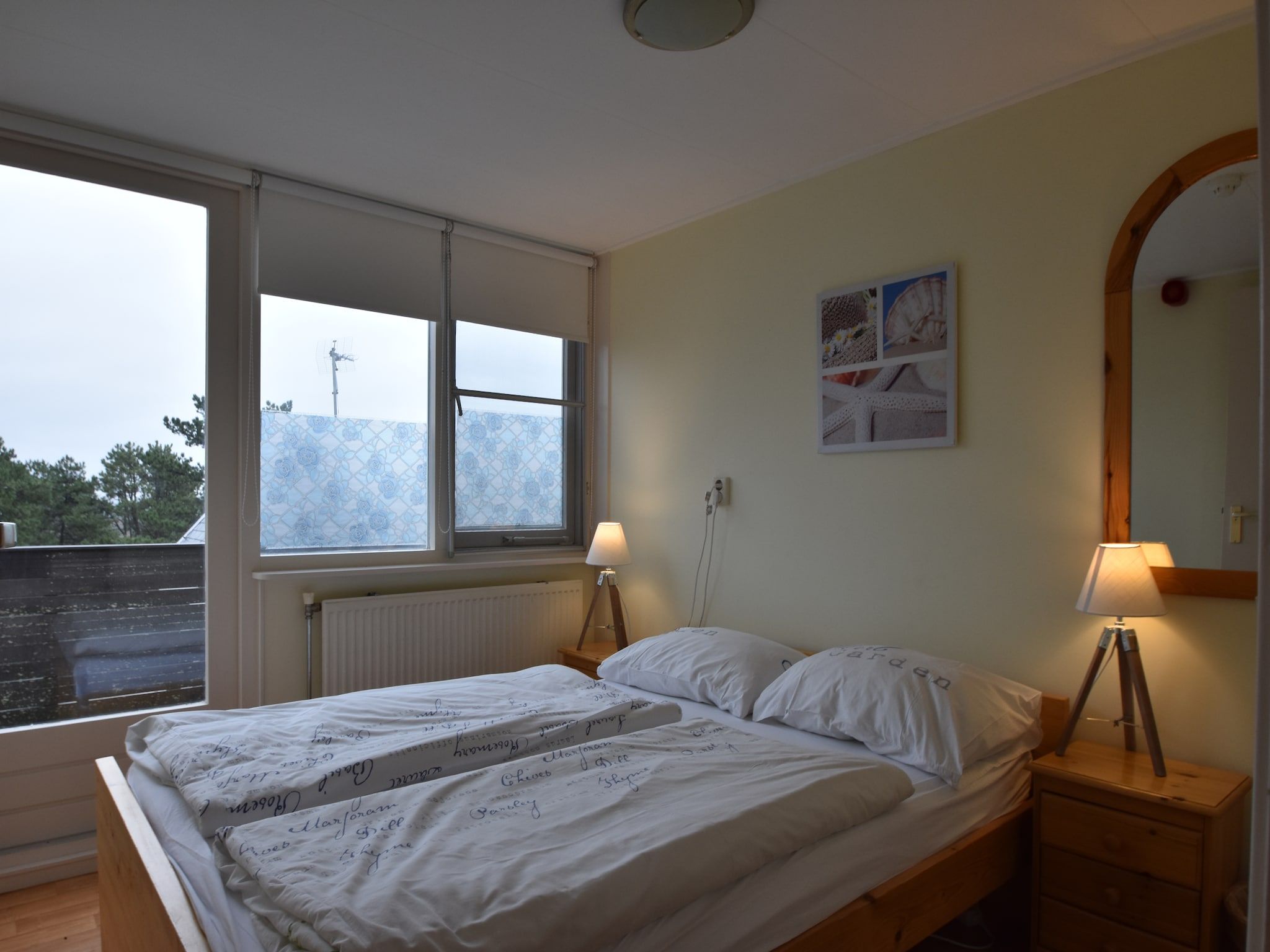 Een slaapkamer van Huize Glory Topaas in Bergen aan Zee