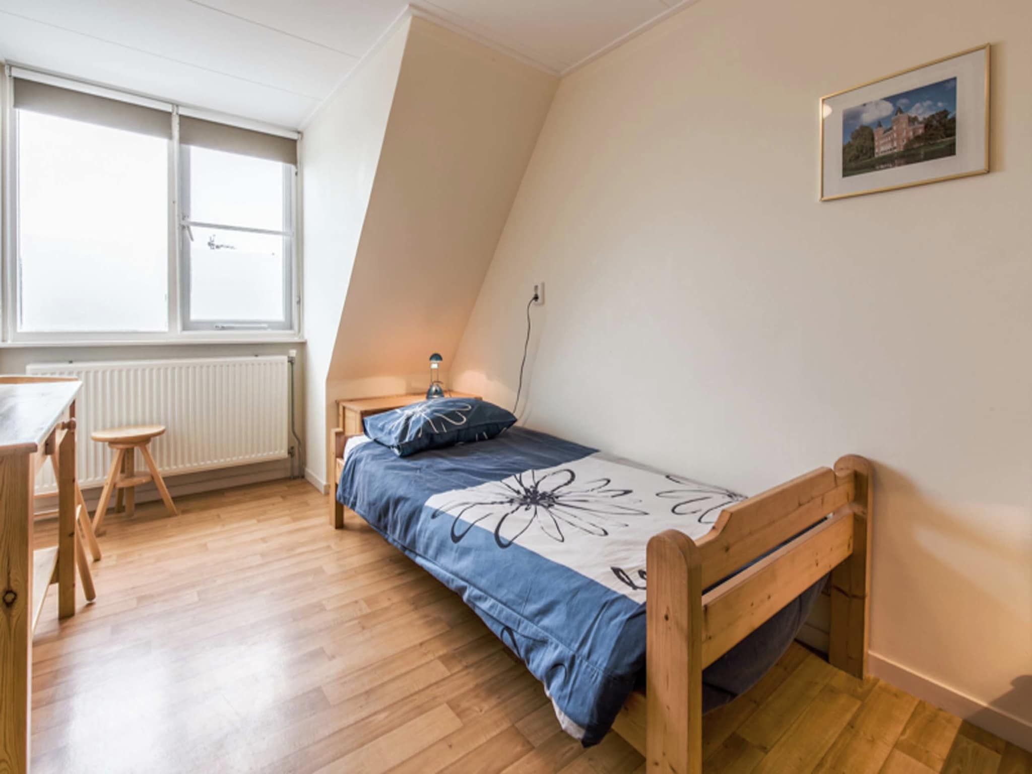 Een slaapkamer van Huize Glory Topaas in Bergen aan Zee
