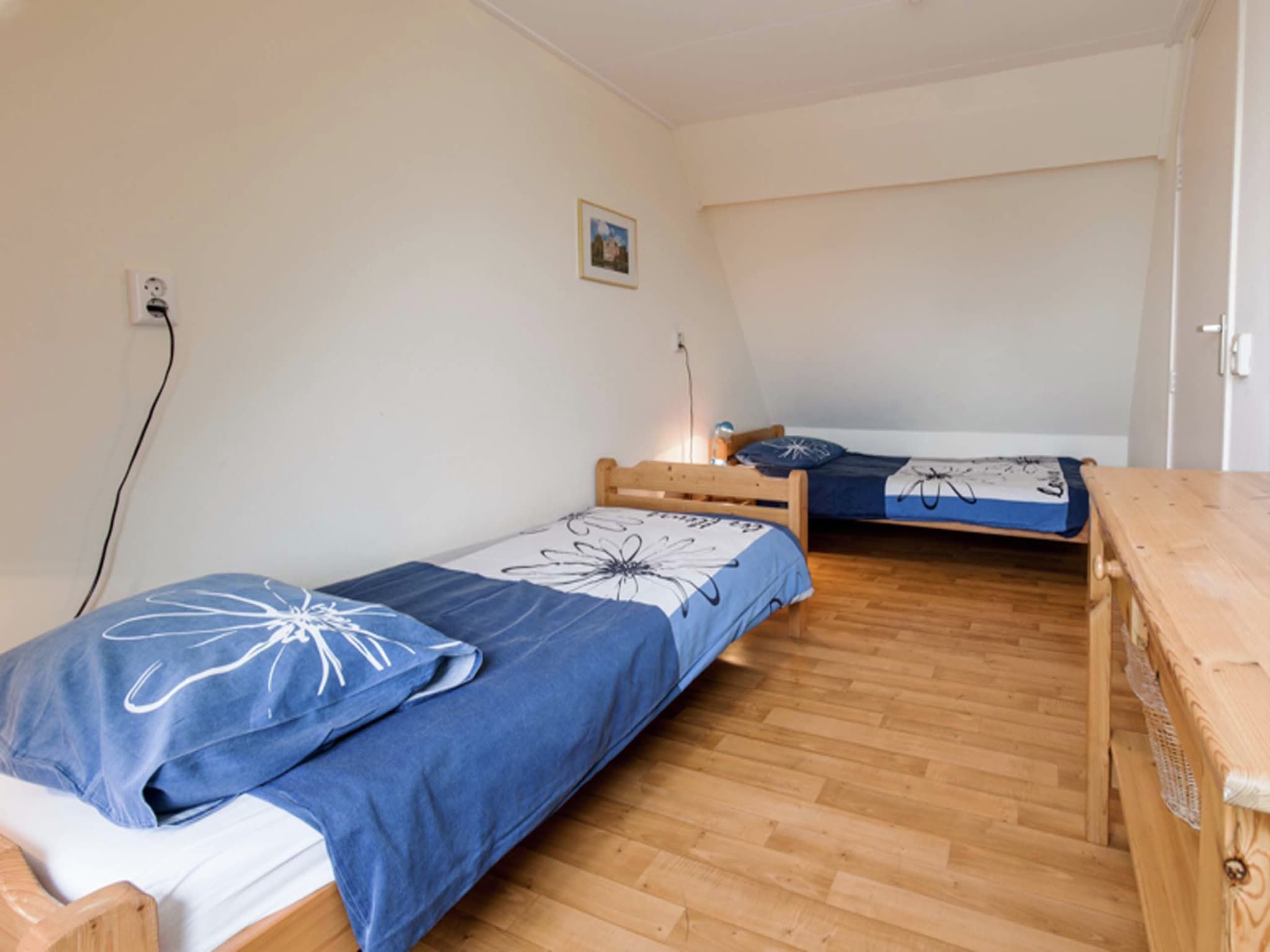 Een slaapkamer van Huize Glory Topaas in Bergen aan Zee