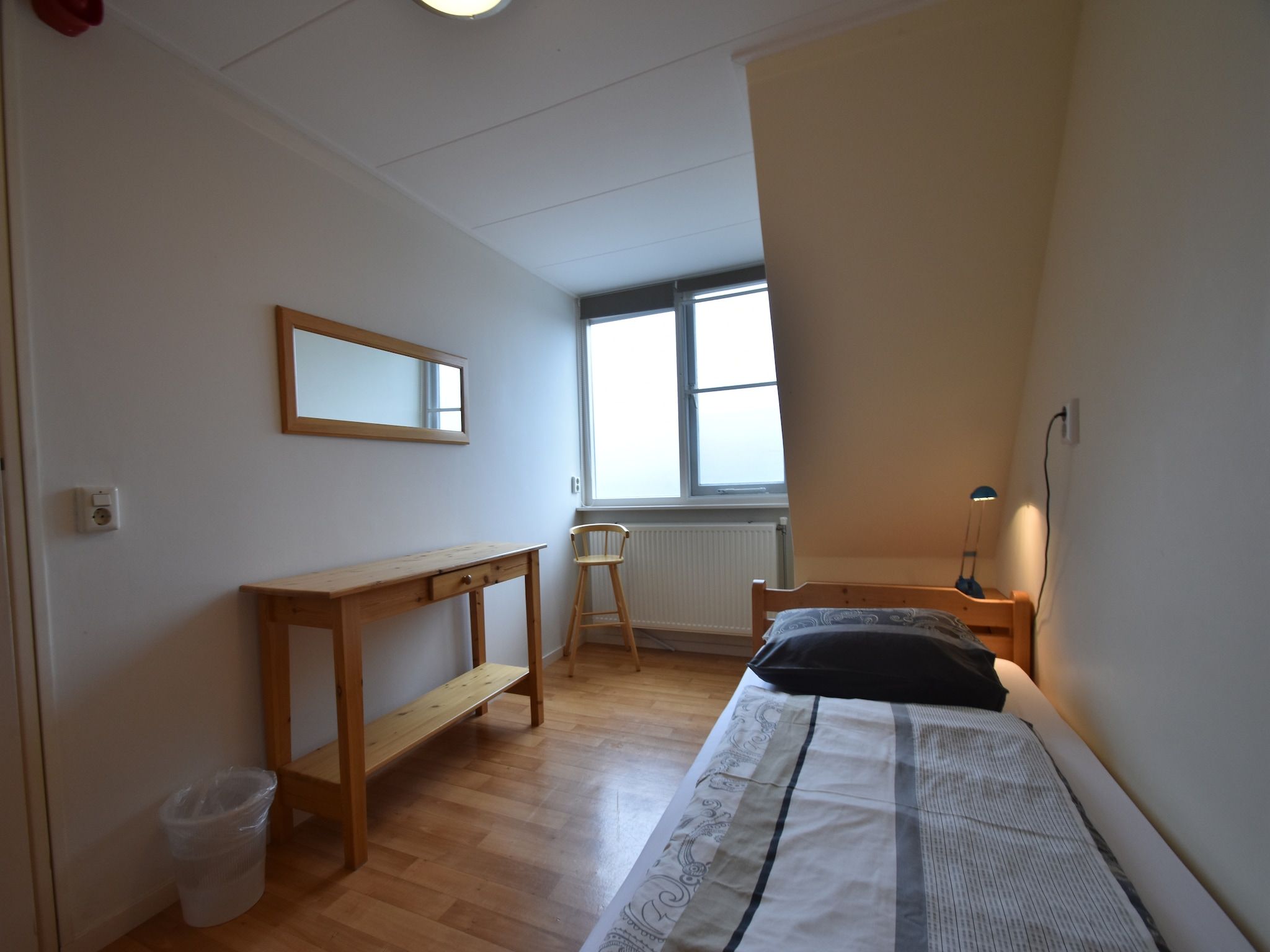 Een slaapkamer van Huize Glory Jade in Bergen aan zee