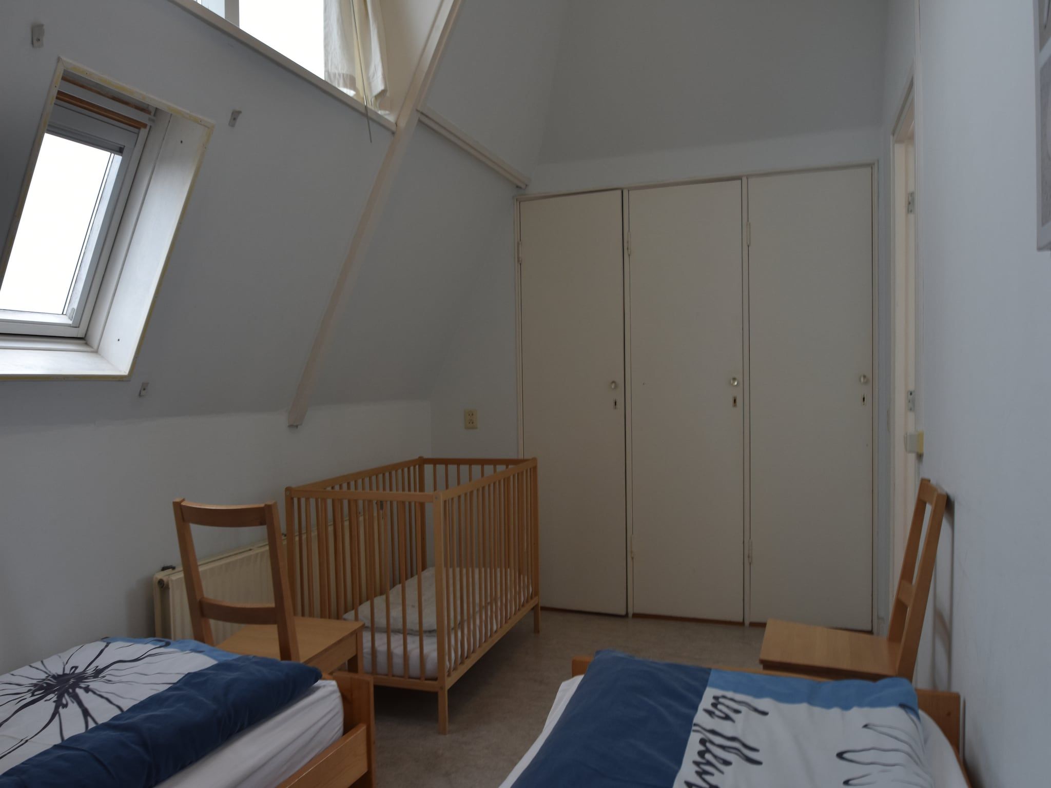 Een slaapkamer van Huize Glory Jade in Bergen aan zee