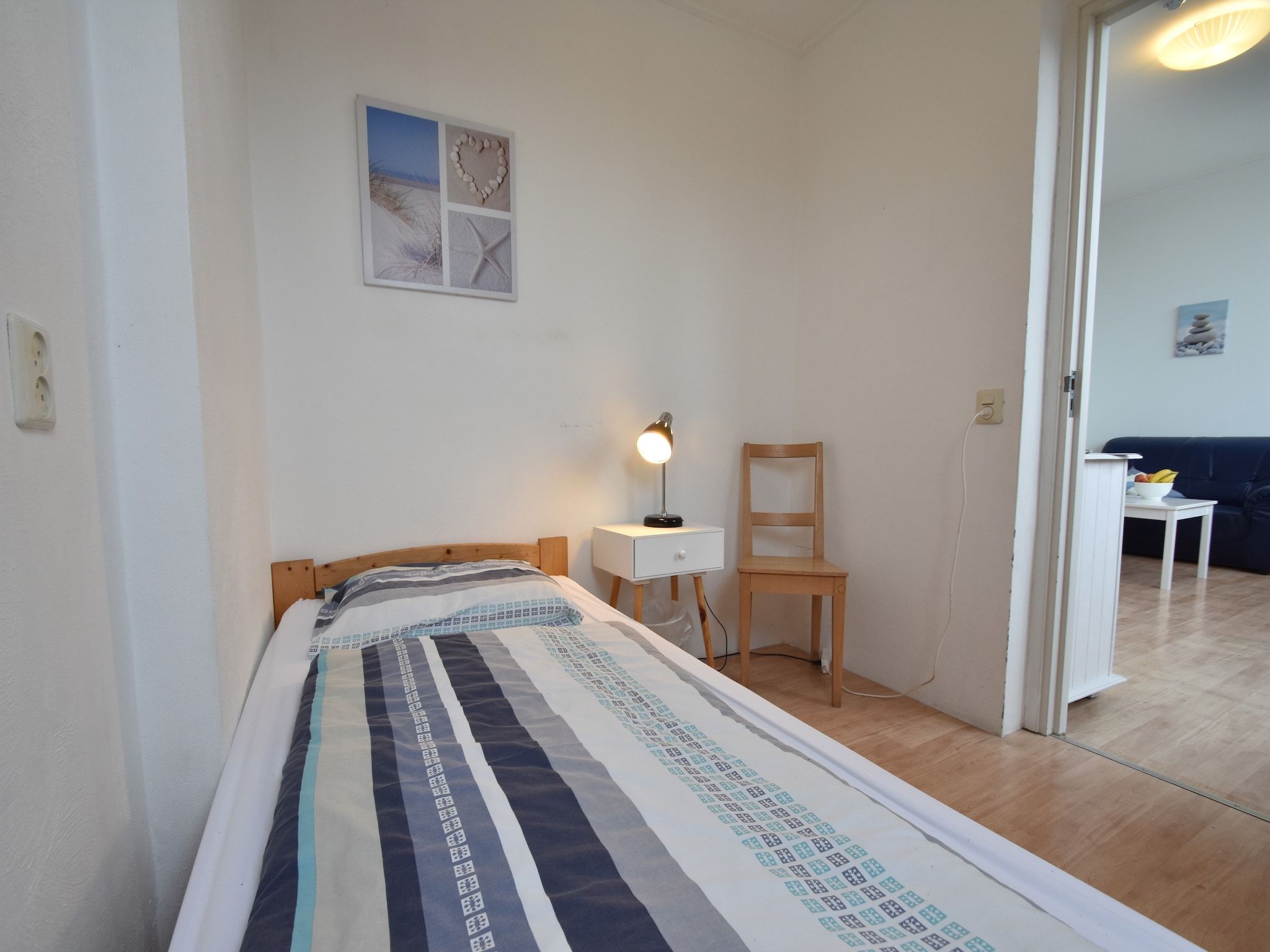 Een slaapkamer van Huize Glory Jade in Bergen aan zee