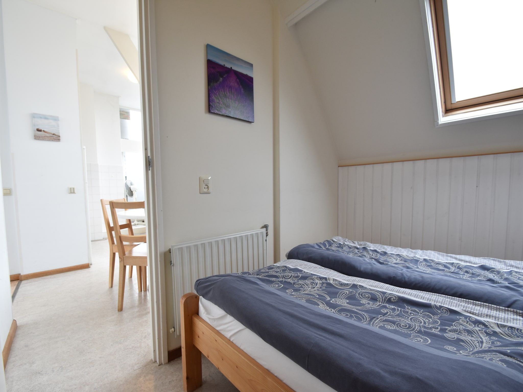 Een slaapkamer van Huize Glory Jade in Bergen aan zee