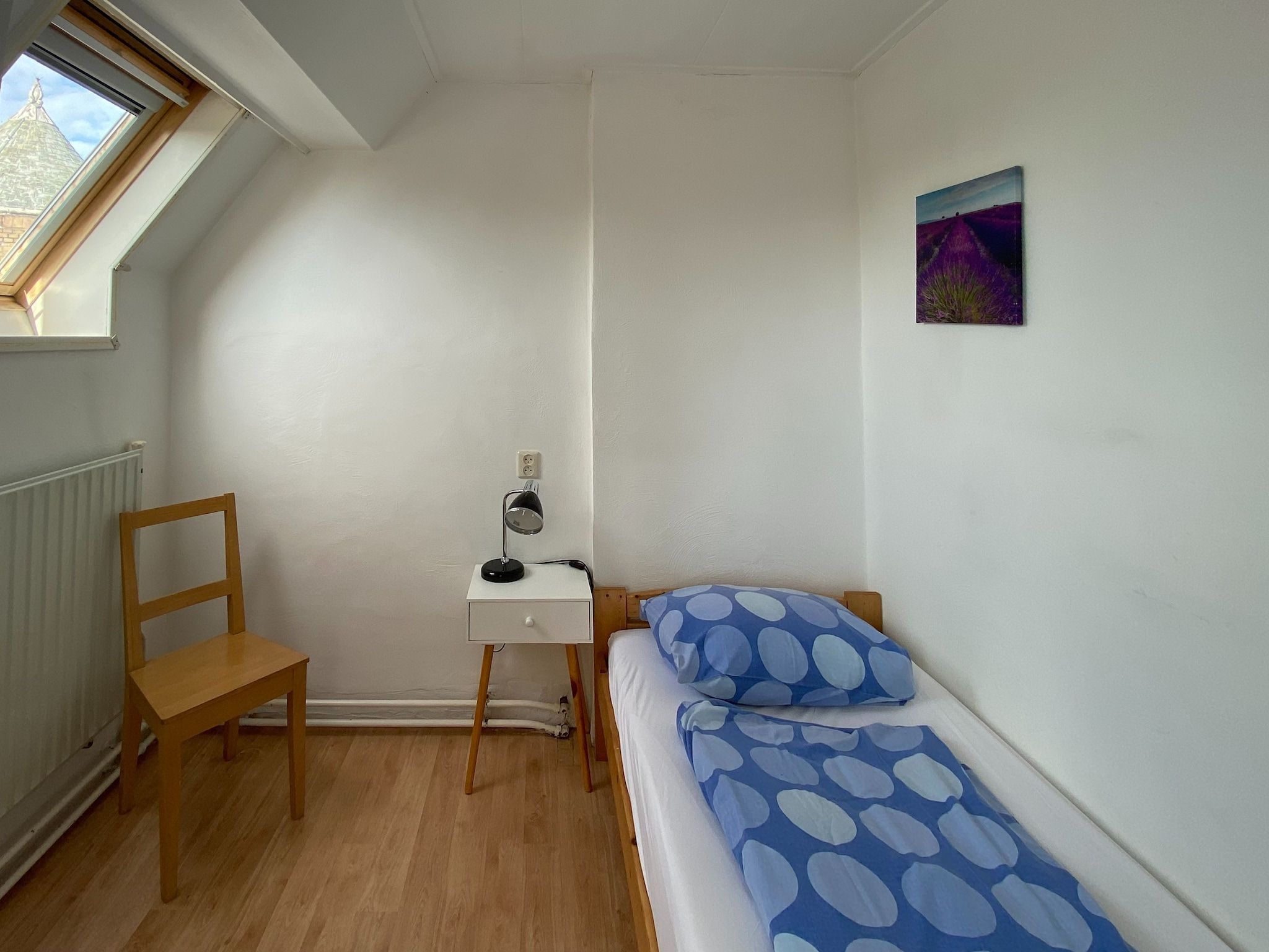 Een slaapkamer van Huize Glory Jade in Bergen aan zee