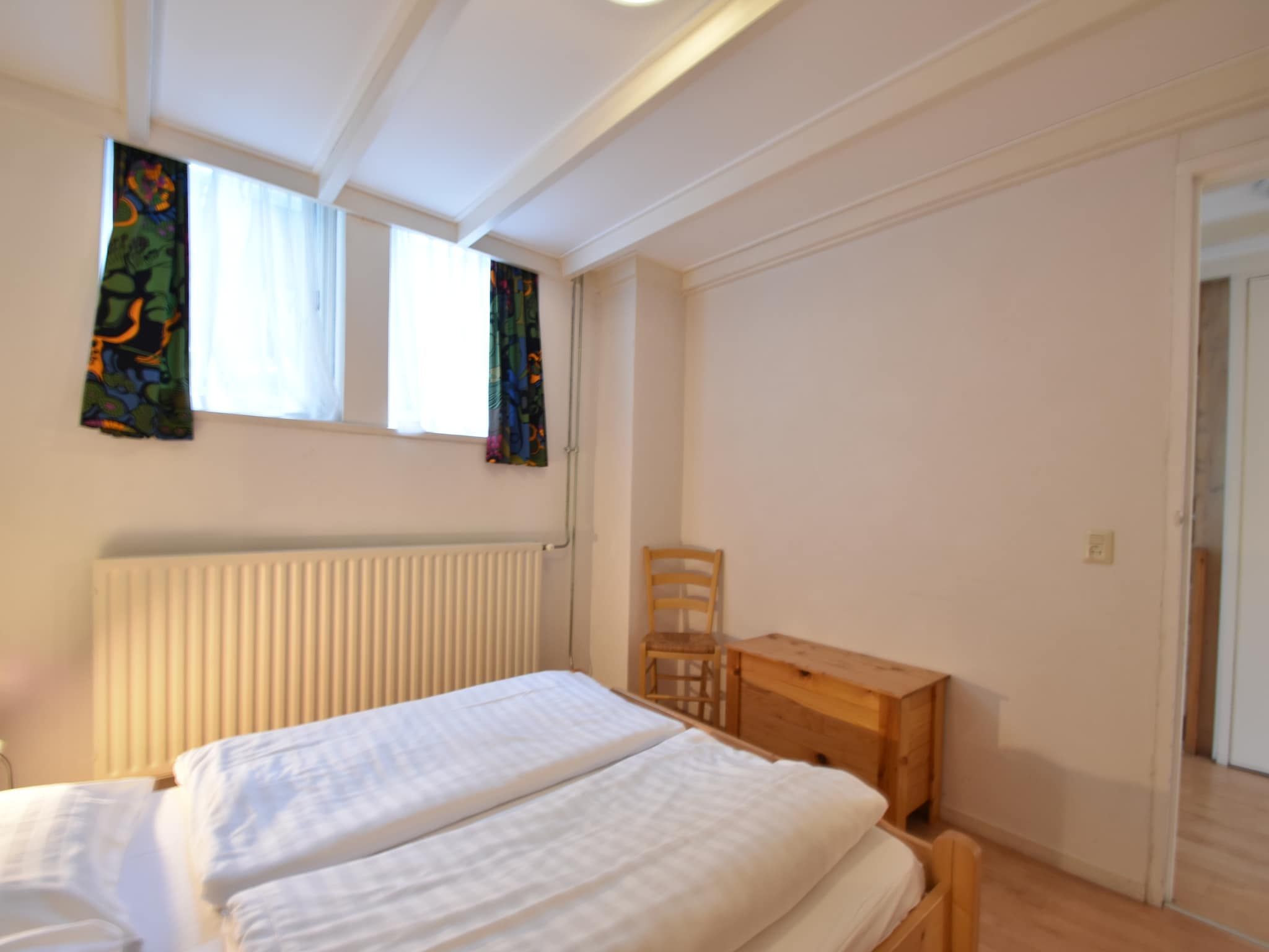 Een slaapkamer van Huize Glory Diamant in Bergen aan zee
