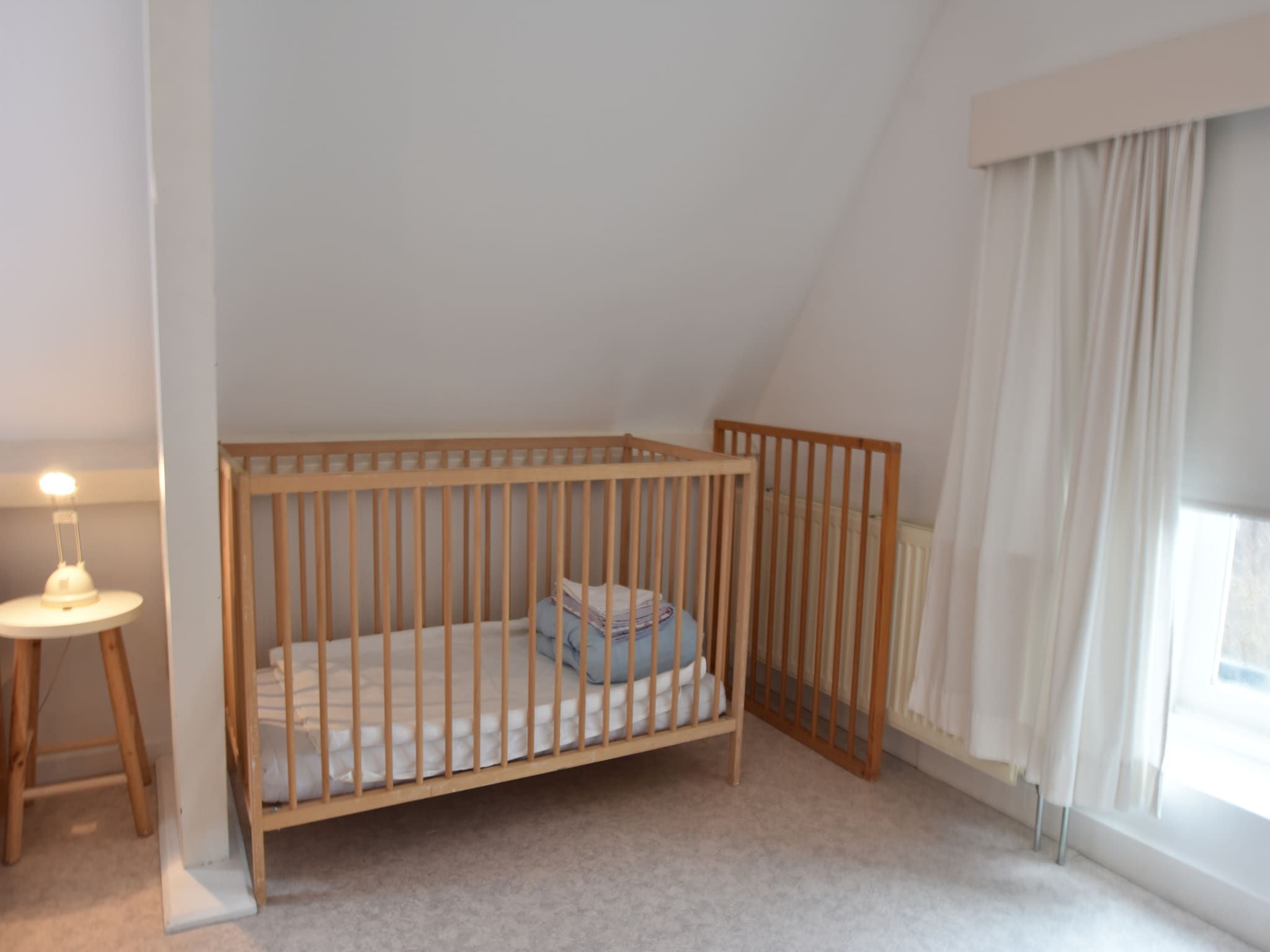 Een slaapkamer van Huize Glory Granaat in Bergen aan zee