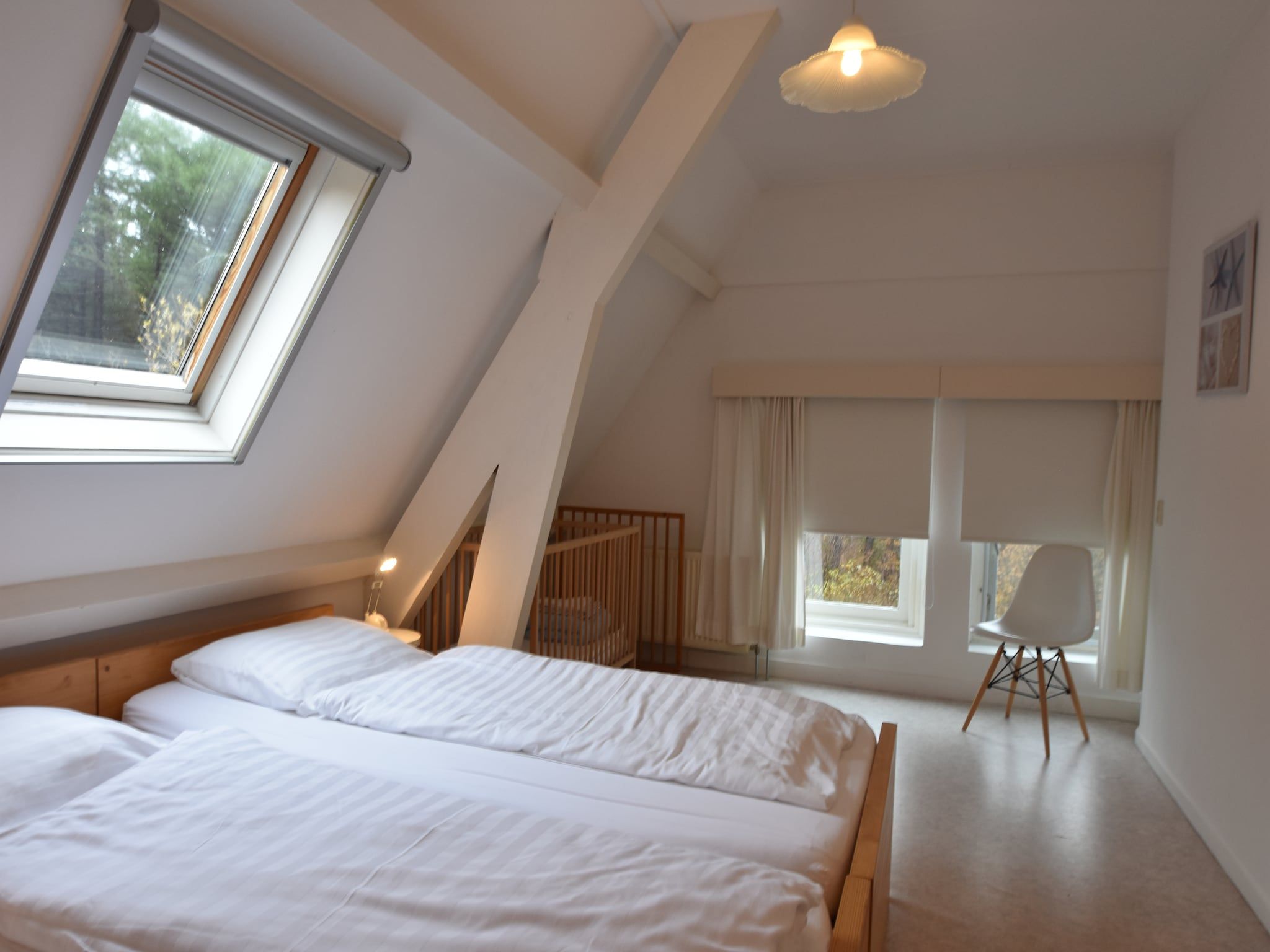 Een slaapkamer van Huize Glory Granaat in Bergen aan zee