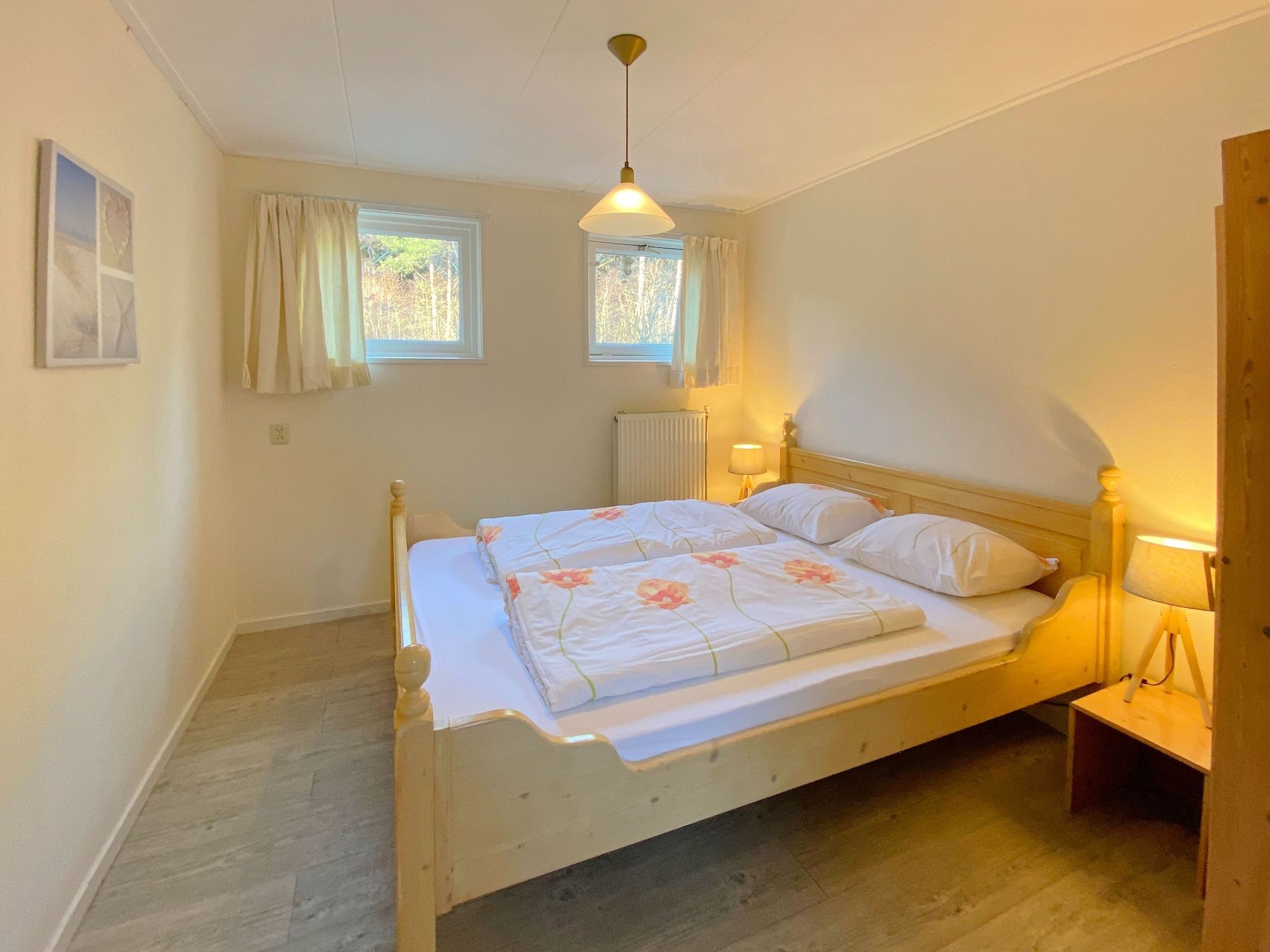 Een slaapkamer van Huize Glory Granaat in Bergen aan zee