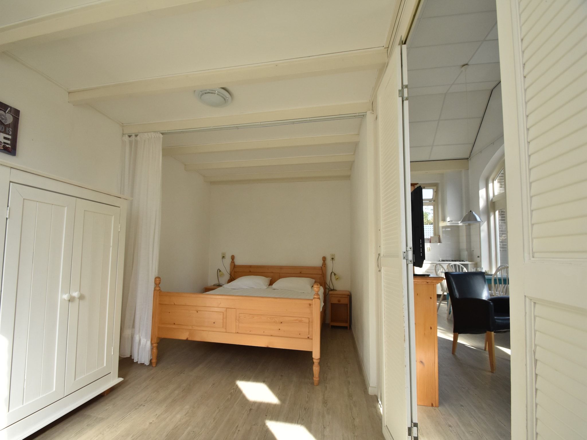 Een slaapkamer van Huize Glory Saffier in Bergen aan zee