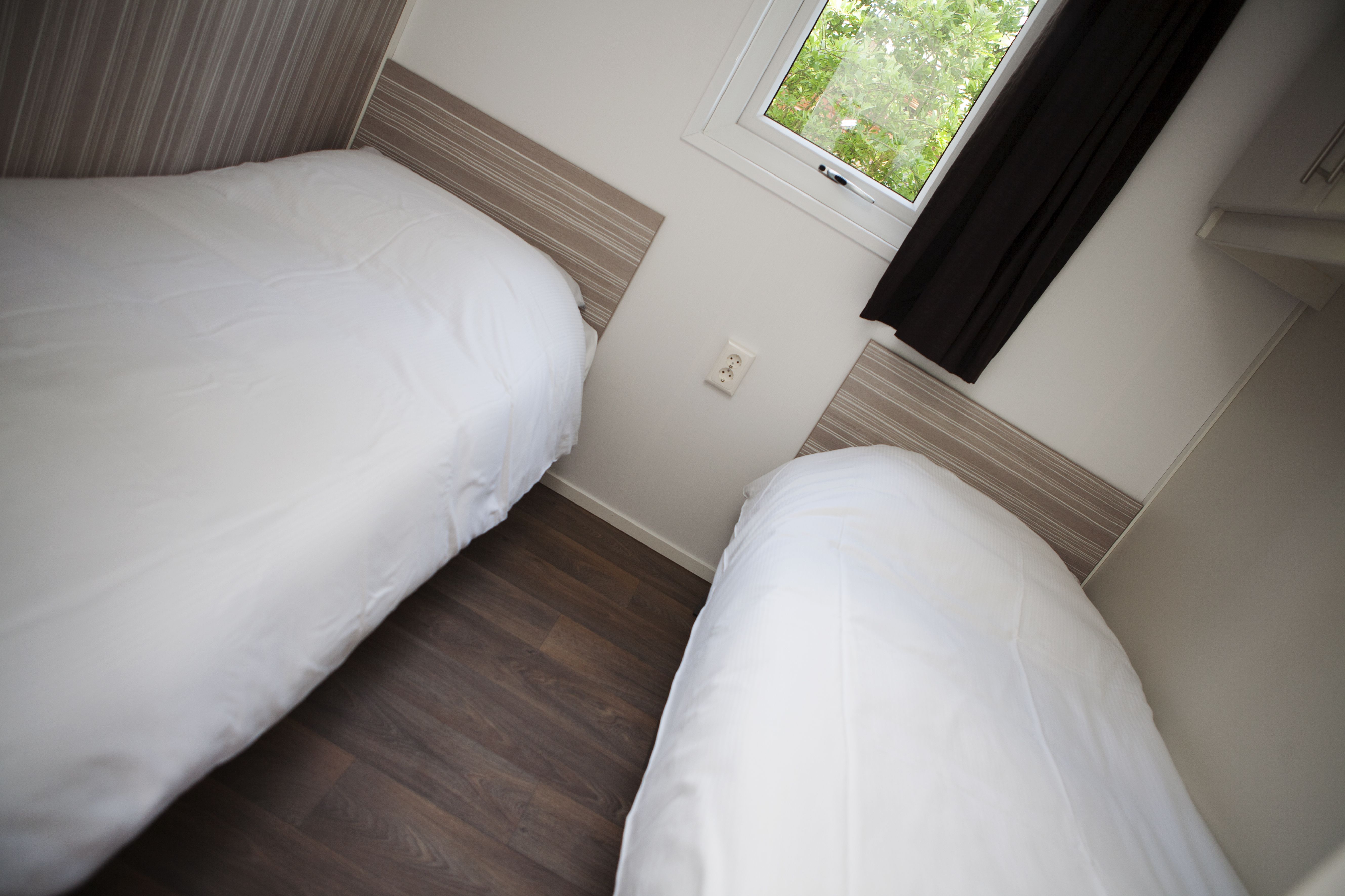 Een slaapkamer van Recreatiepark de Boshoek 5 in Voorthuizen