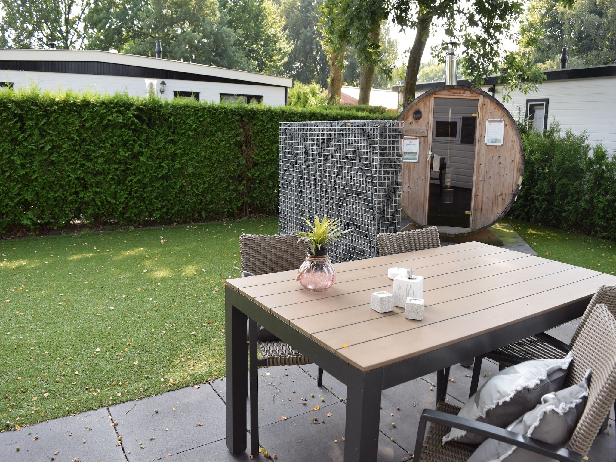 De tuin van Recreatiepark de Boshoek 5 in Voorthuizen