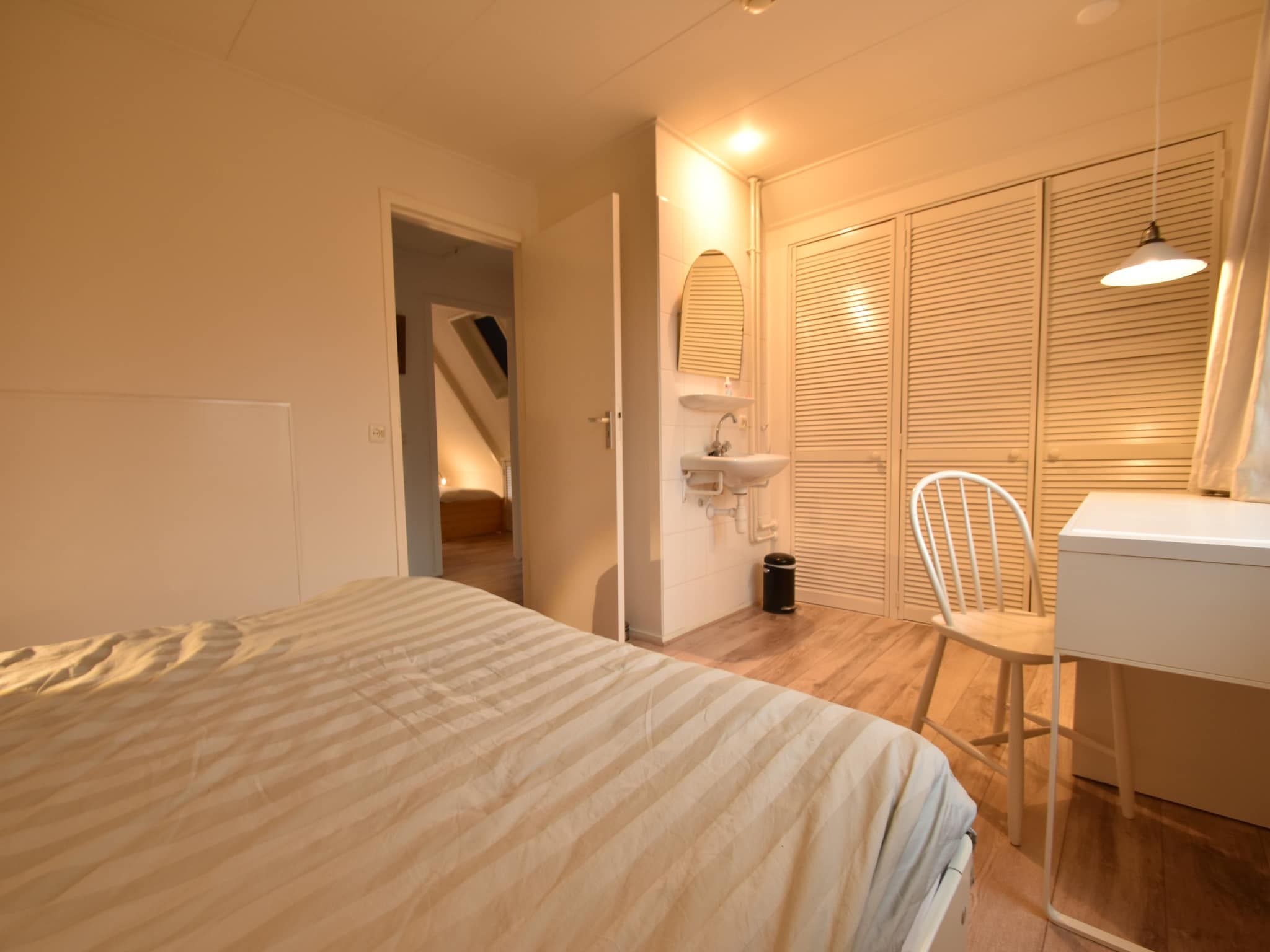 Een slaapkamer van Bergens Roodborstje in Bergen