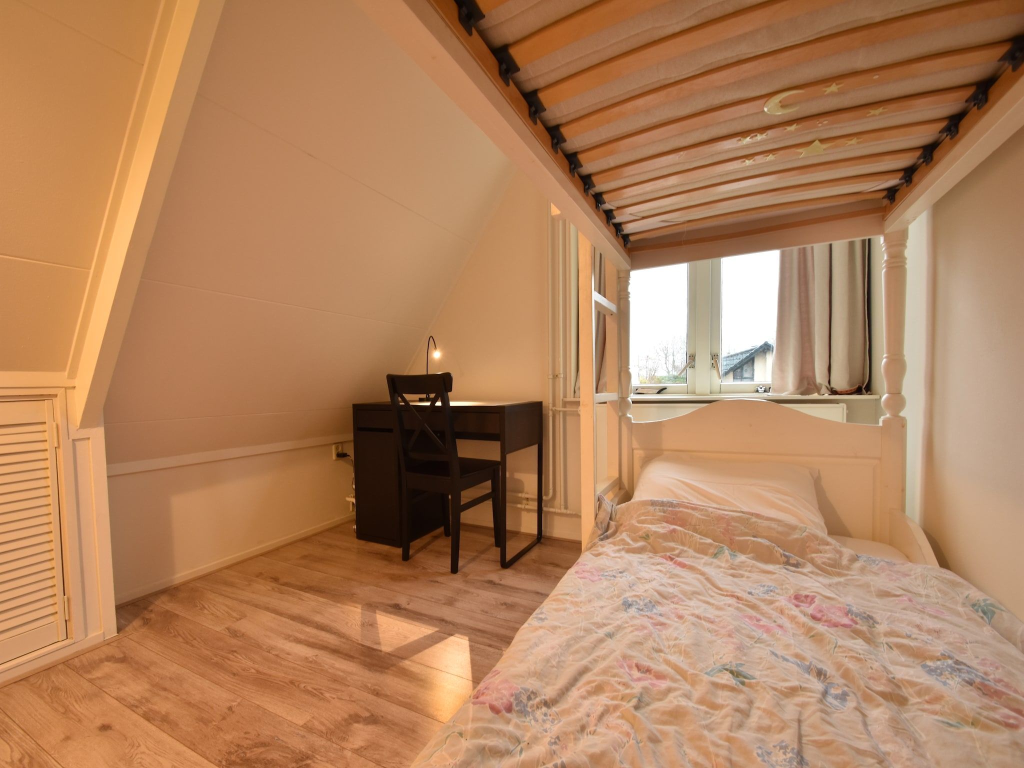 Een slaapkamer van Bergens Roodborstje in Bergen