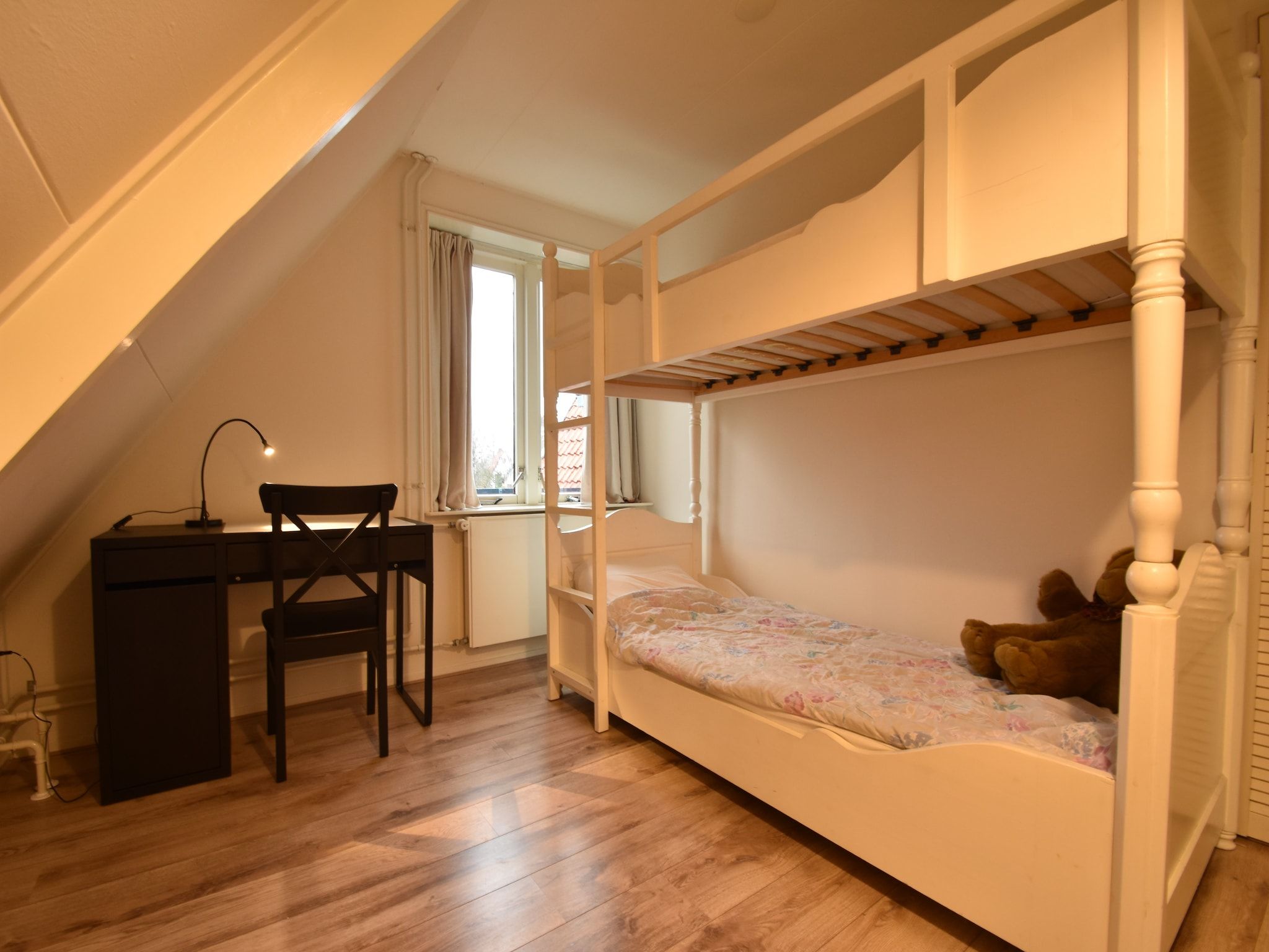 Een slaapkamer van Bergens Roodborstje in Bergen