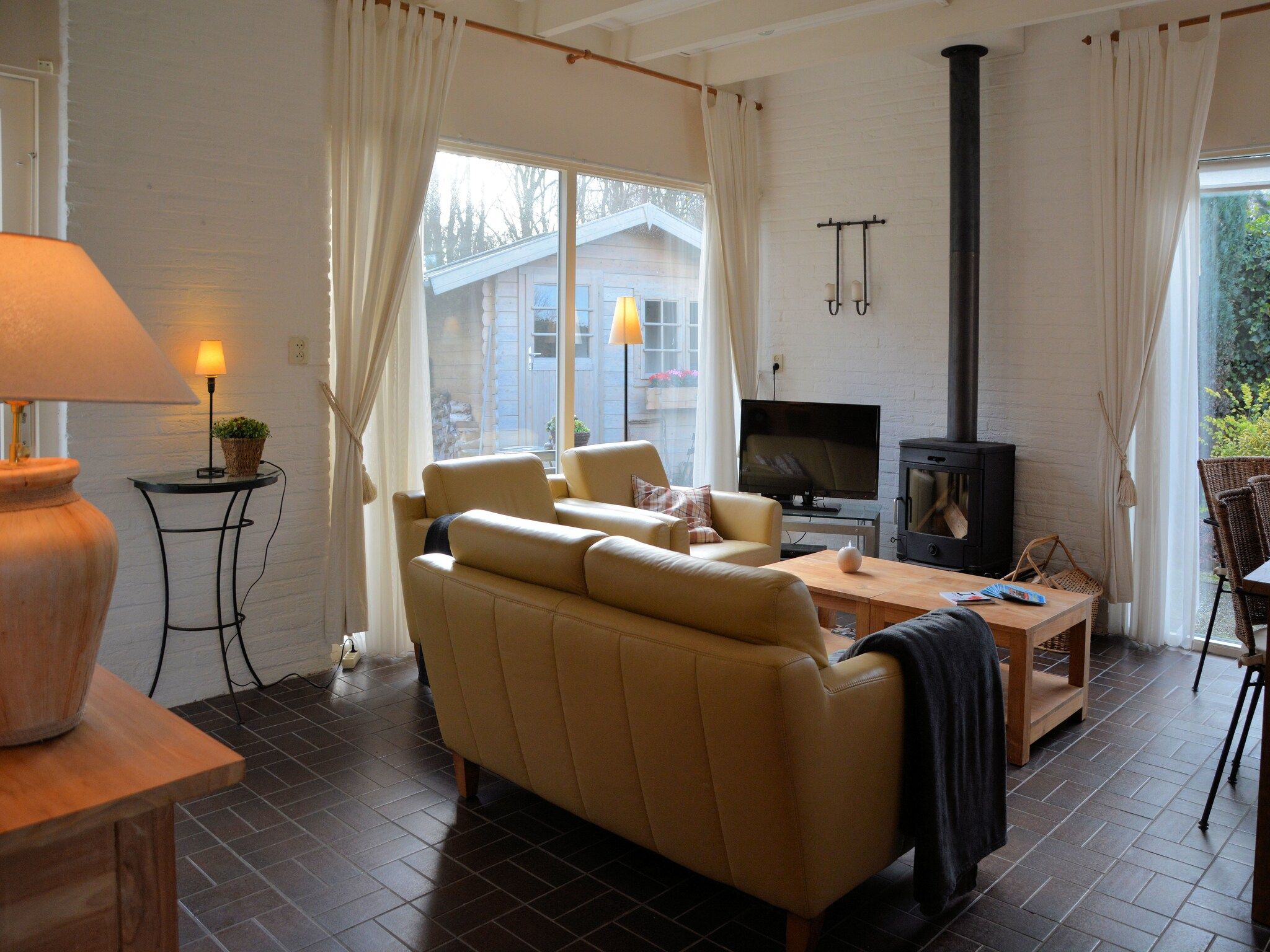 De woonkamer van Bos-Lodge in Noordwijkerhout