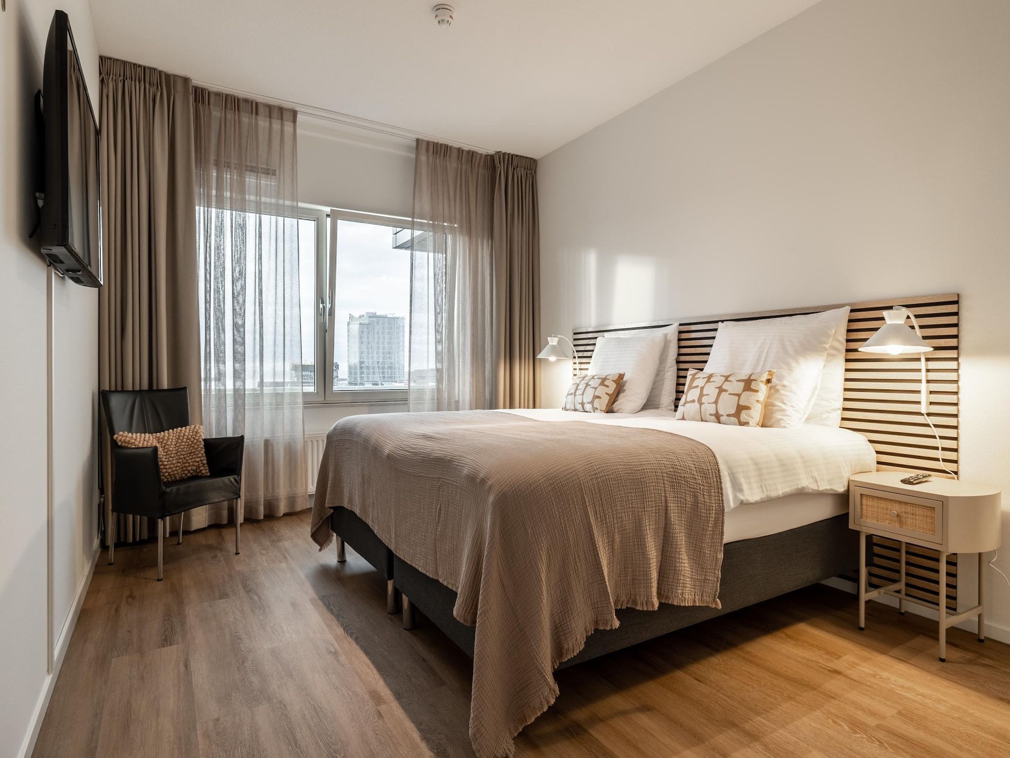 Een slaapkamer van Scheveningen Harbour 50B in Scheveningen