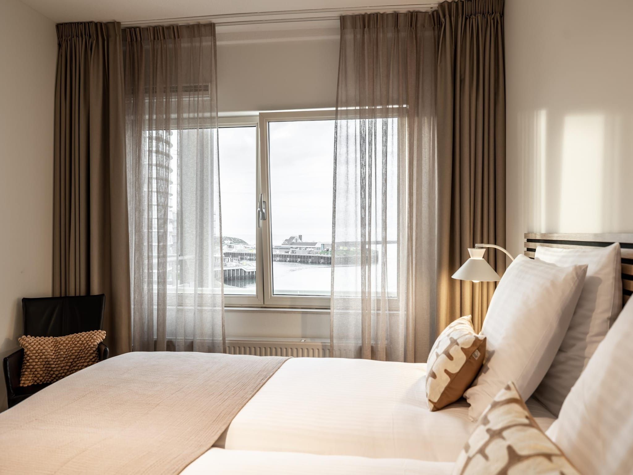 Een slaapkamer van Scheveningen Harbour 50B in Scheveningen