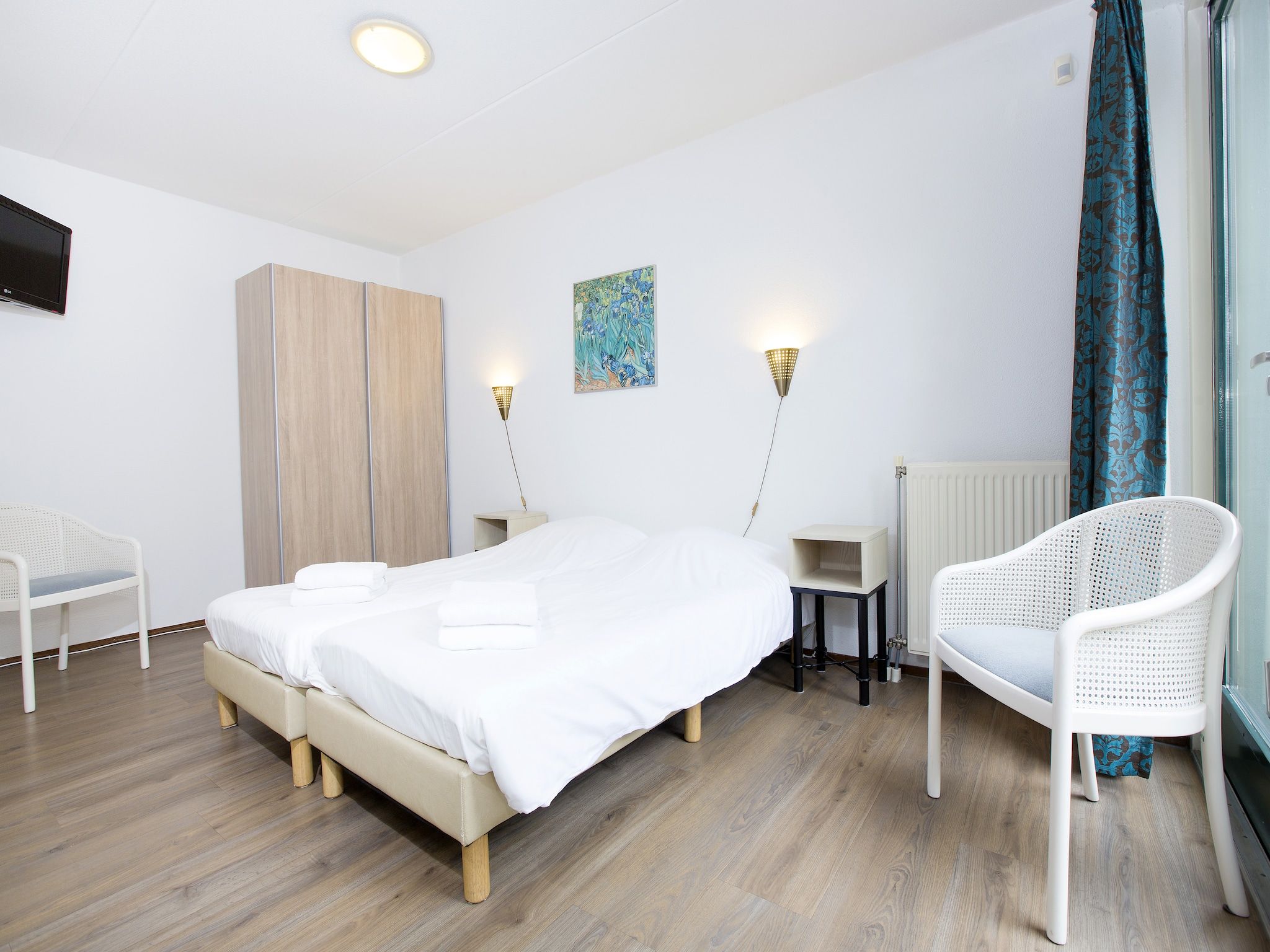 Een slaapkamer van Vakantiepark Kijkduin 7 in Den Haag