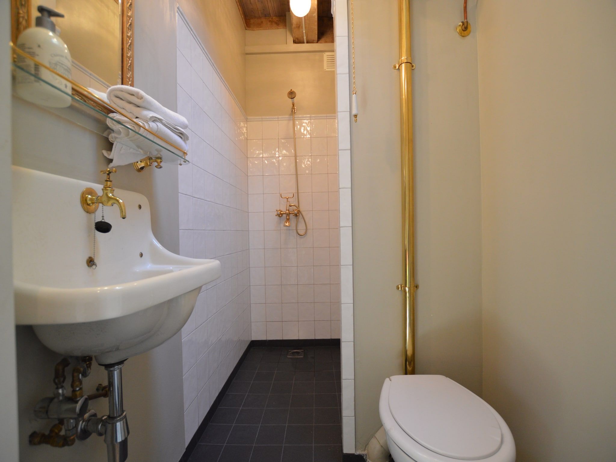 De badkamer van Guesthouse The Old Cottage in Volkel