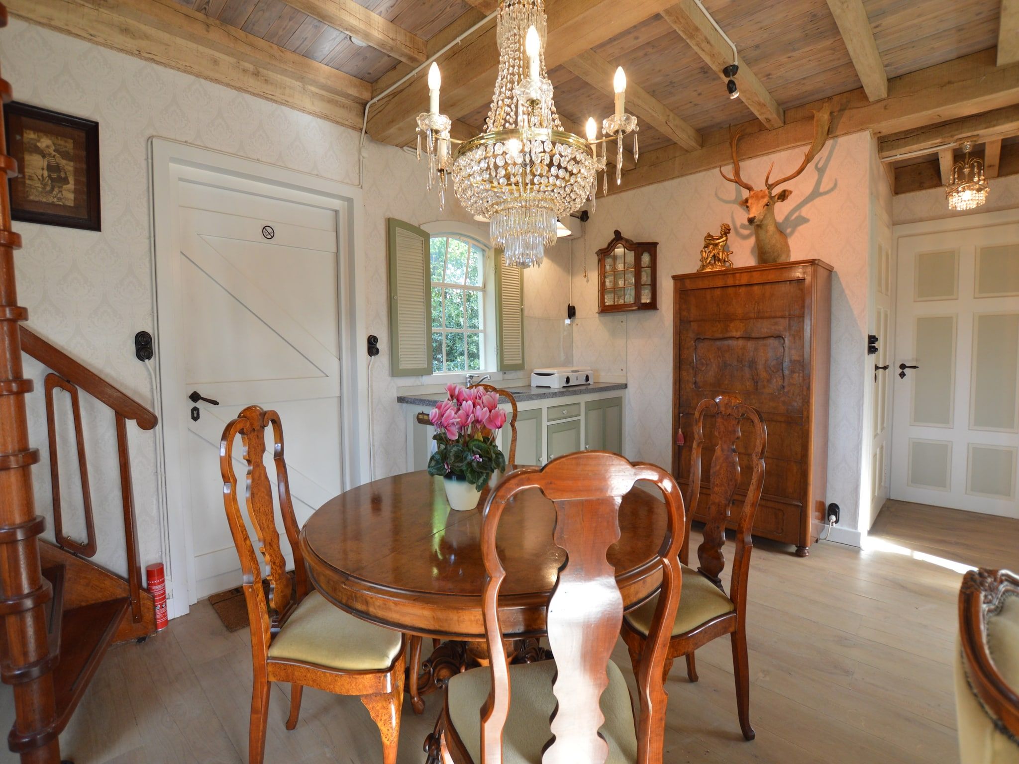 De eetkamer van Guesthouse The Old Cottage in Volkel