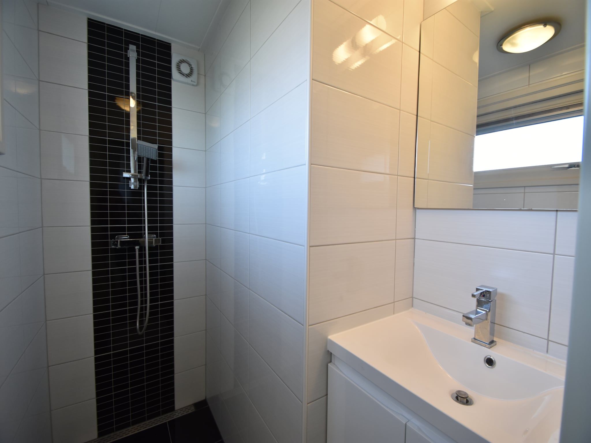 De badkamer van Weidse Blik in Kattendijke