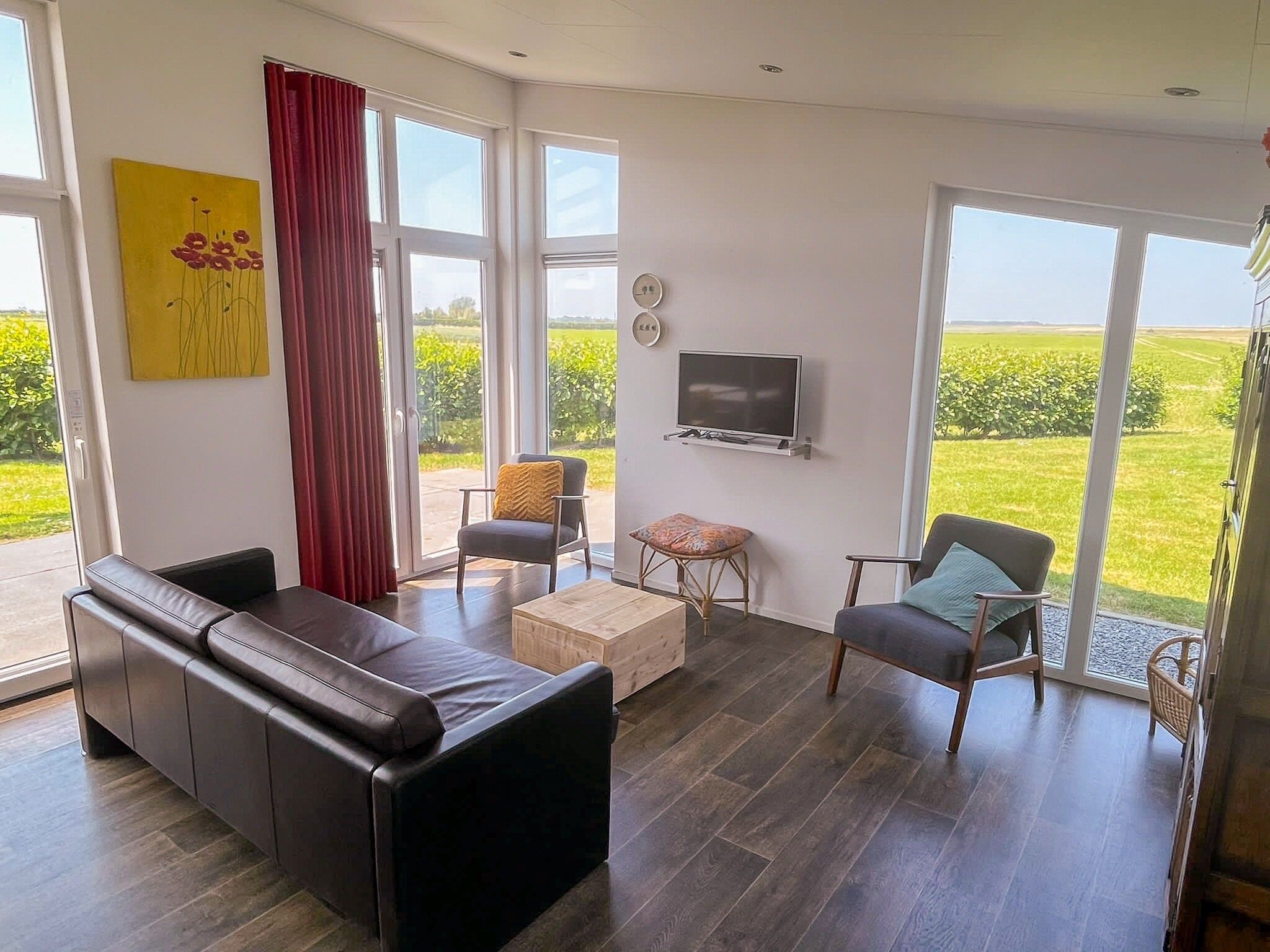 De woonkamer van Water Resort Oosterschelde 51 in Wemeldinge