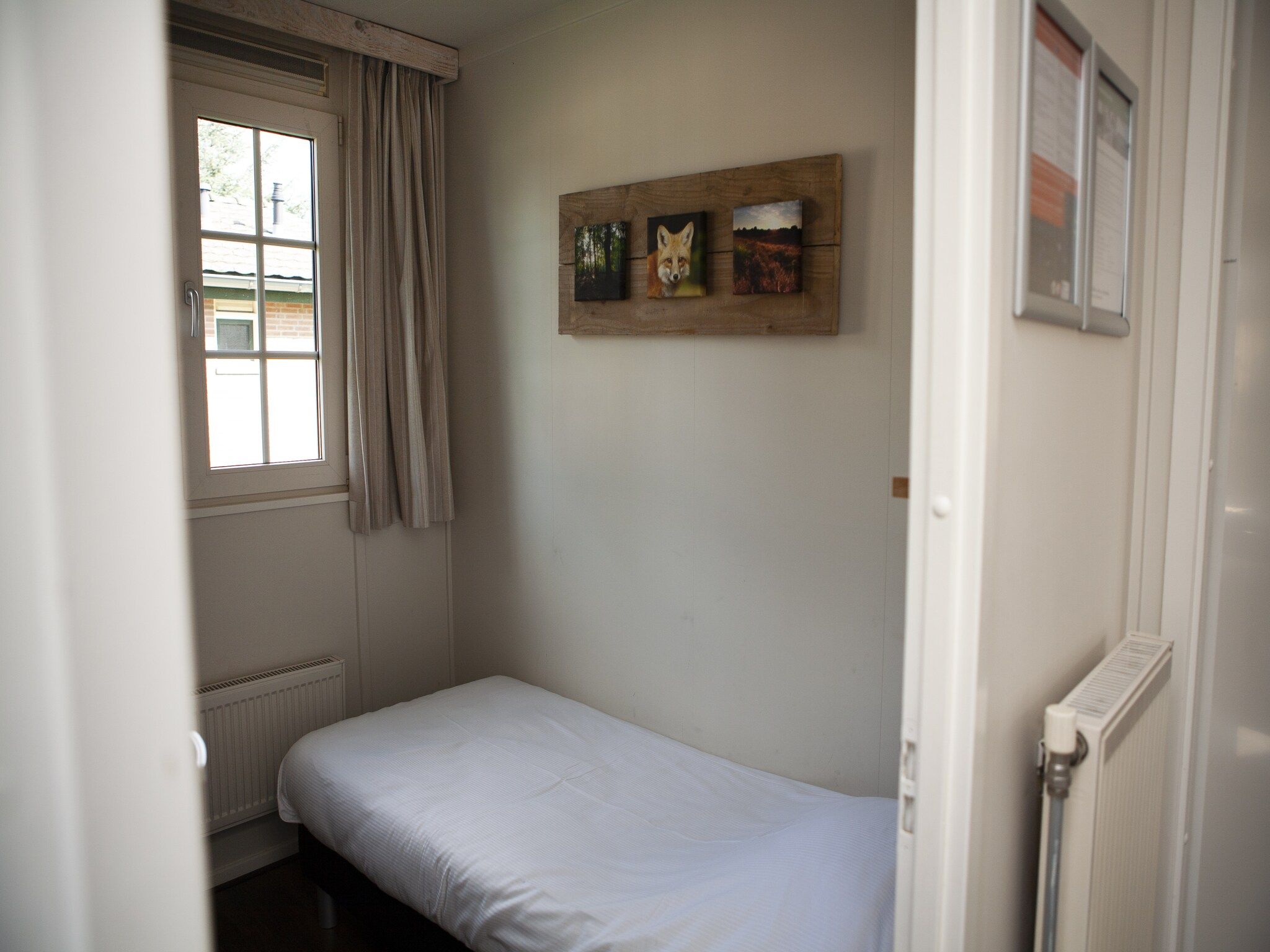 Een slaapkamer van Recreatiepark de Boshoek 10 in Voorthuizen