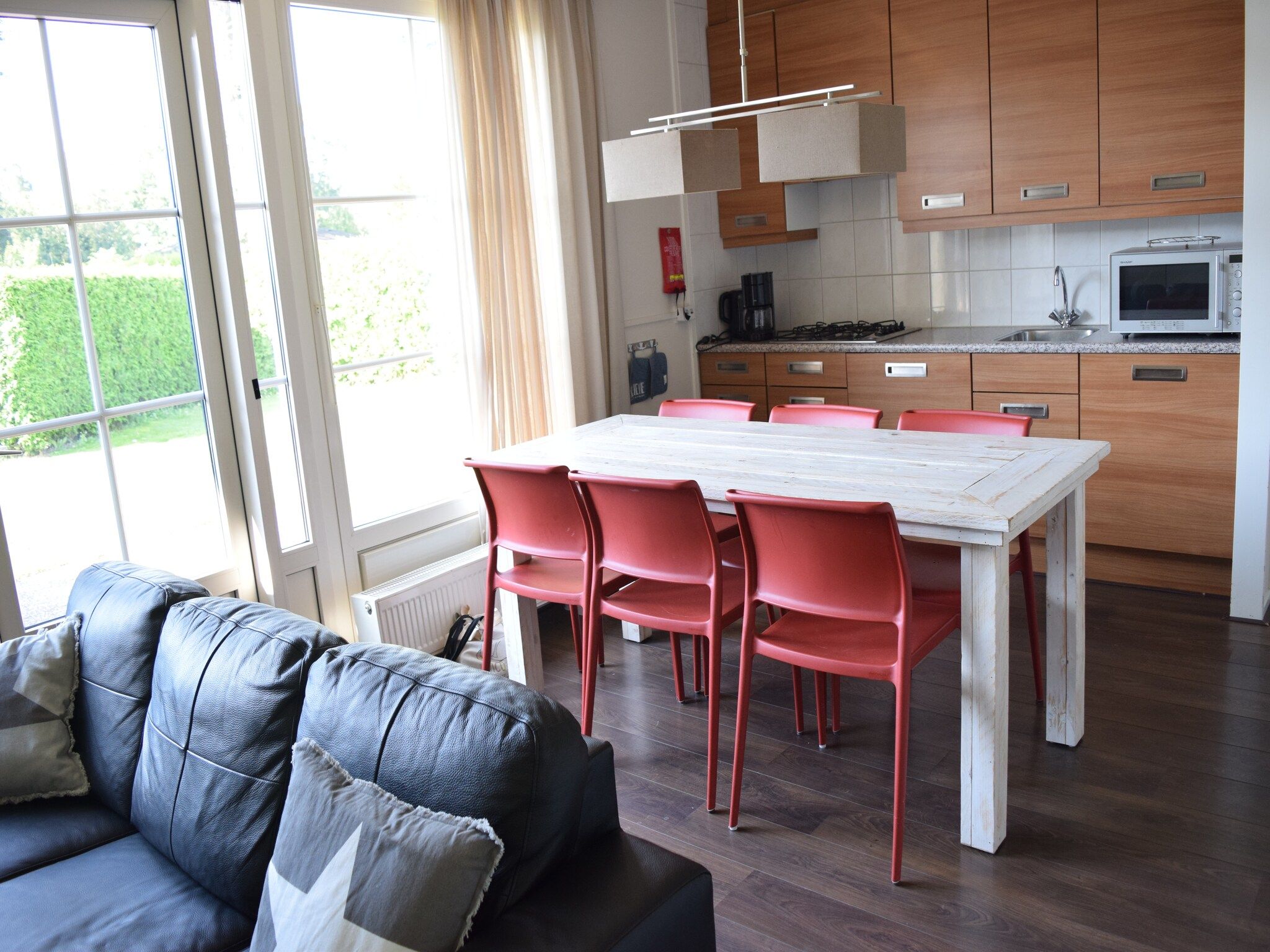 De woonkamer van Recreatiepark de Boshoek 11 in Voorthuizen