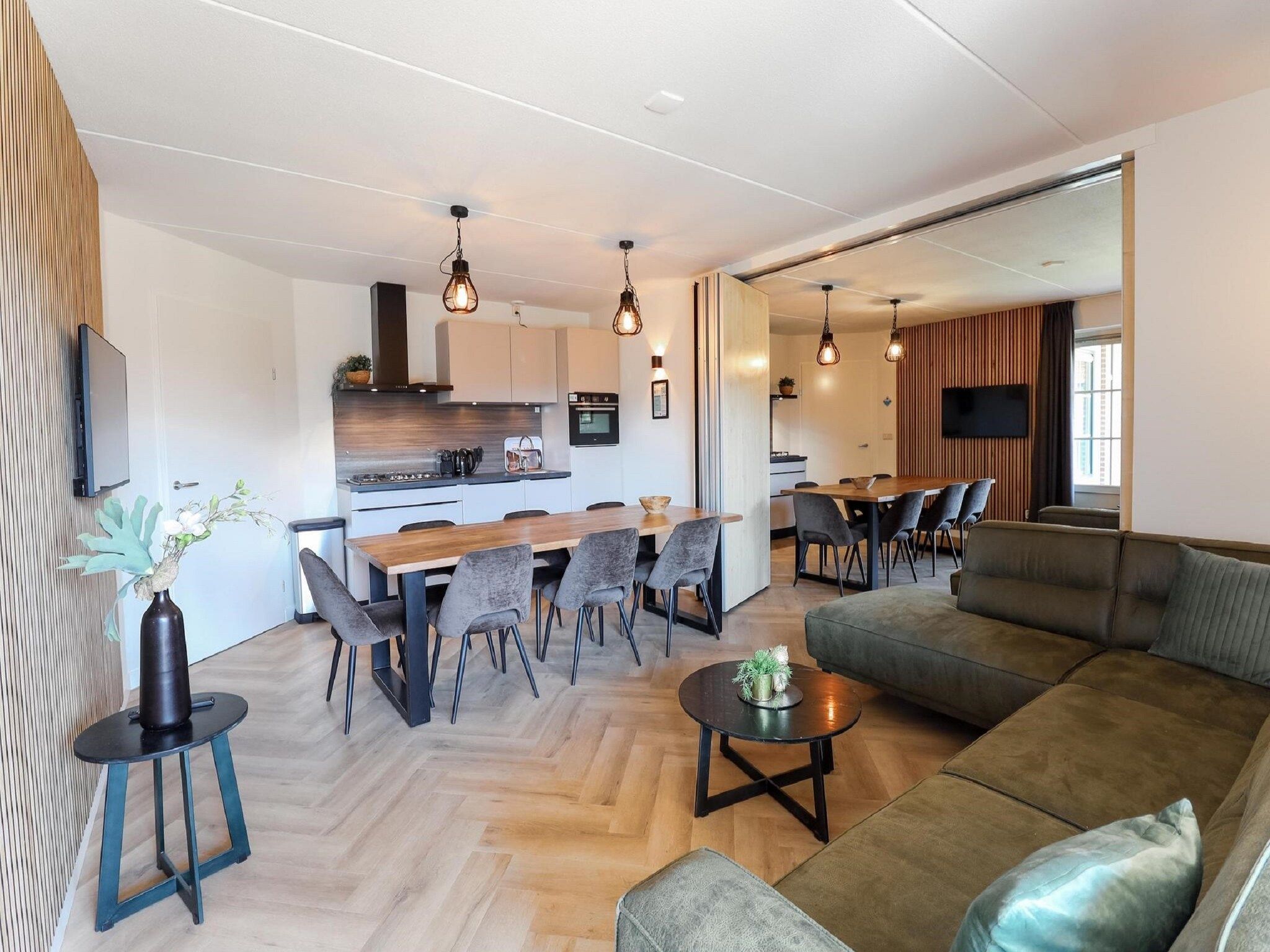 De woonkamer van Recreatiepark de Boshoek 14 in Voorthuizen
