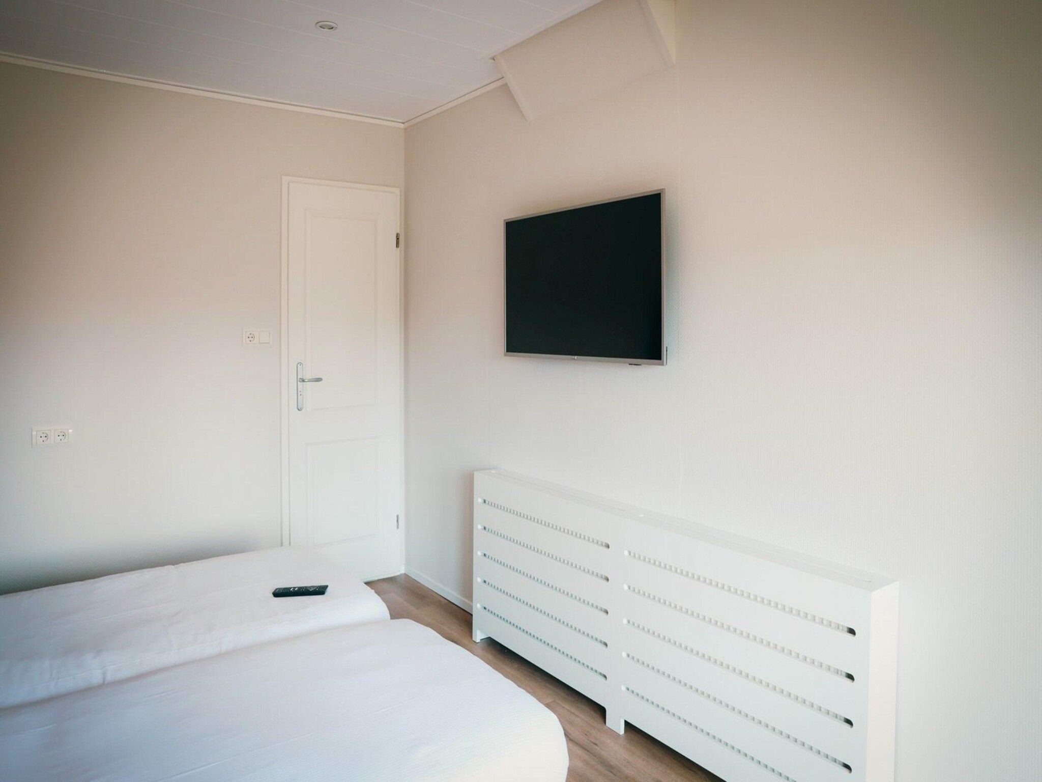Een slaapkamer van Recreatiepark de Boshoek 16 in Voorthuizen