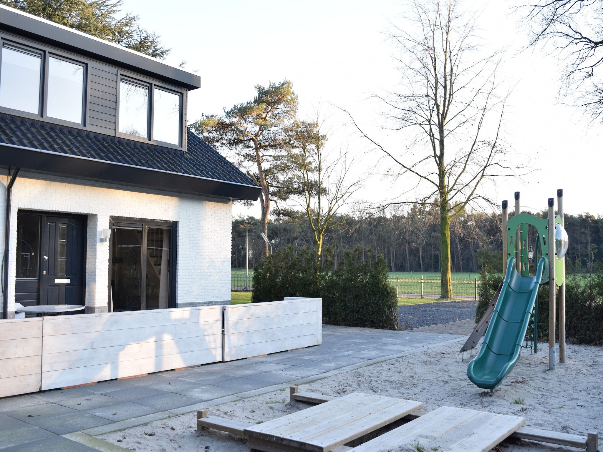 De tuin van Recreatiepark de Boshoek 18 in Voorthuizen